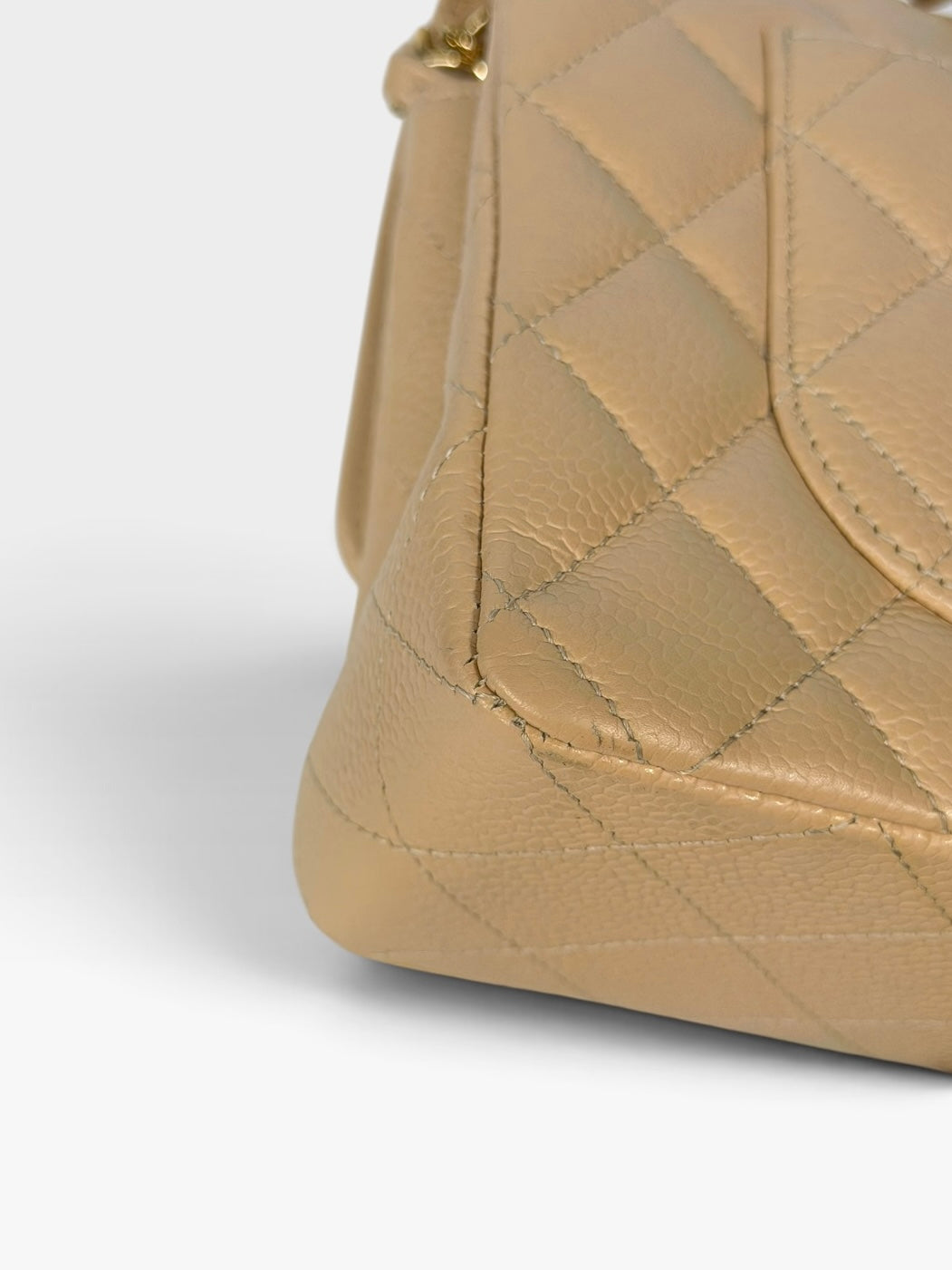 Chanel Small Classic Double Flap In Beige Caviar Leather With Gold Hardware. 100% authentic and preloved in excellent condition.