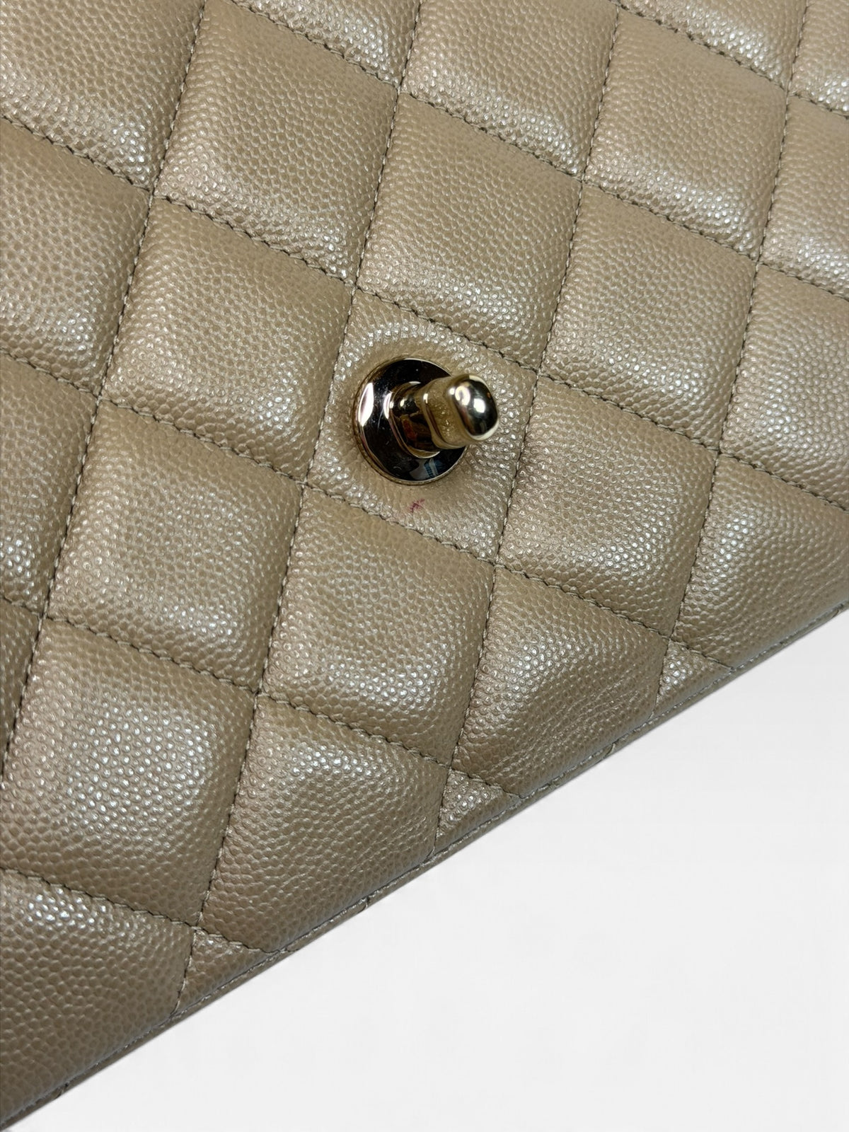 Chanel Maxi Flap In Beige Caviar Leather With Gold Hardware. 100% authentic and pre loved in excellent condition.