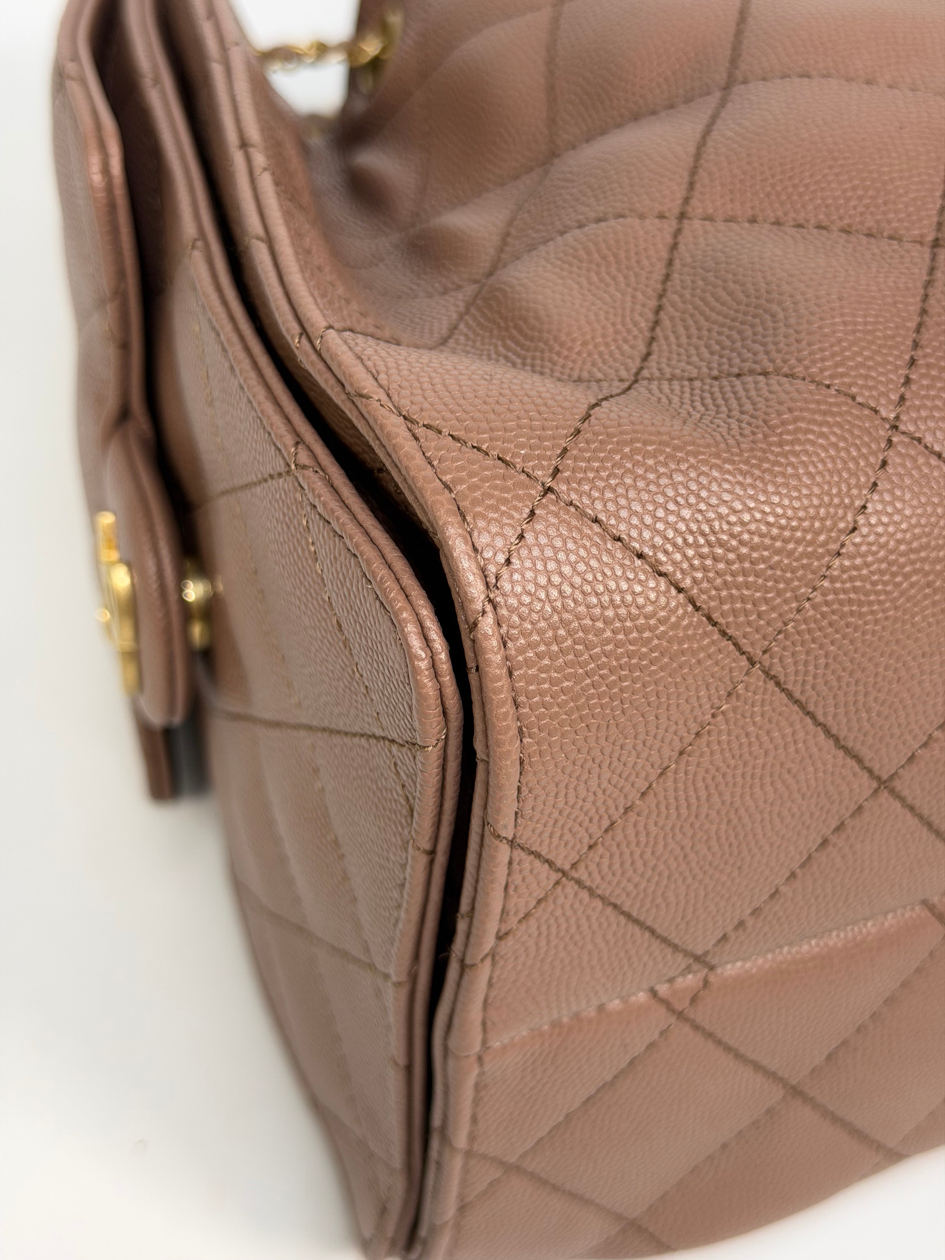 Chanel 25 Small In Brown Caviar Leather With Gold Hardware. Authentic and preloved in excellent condition