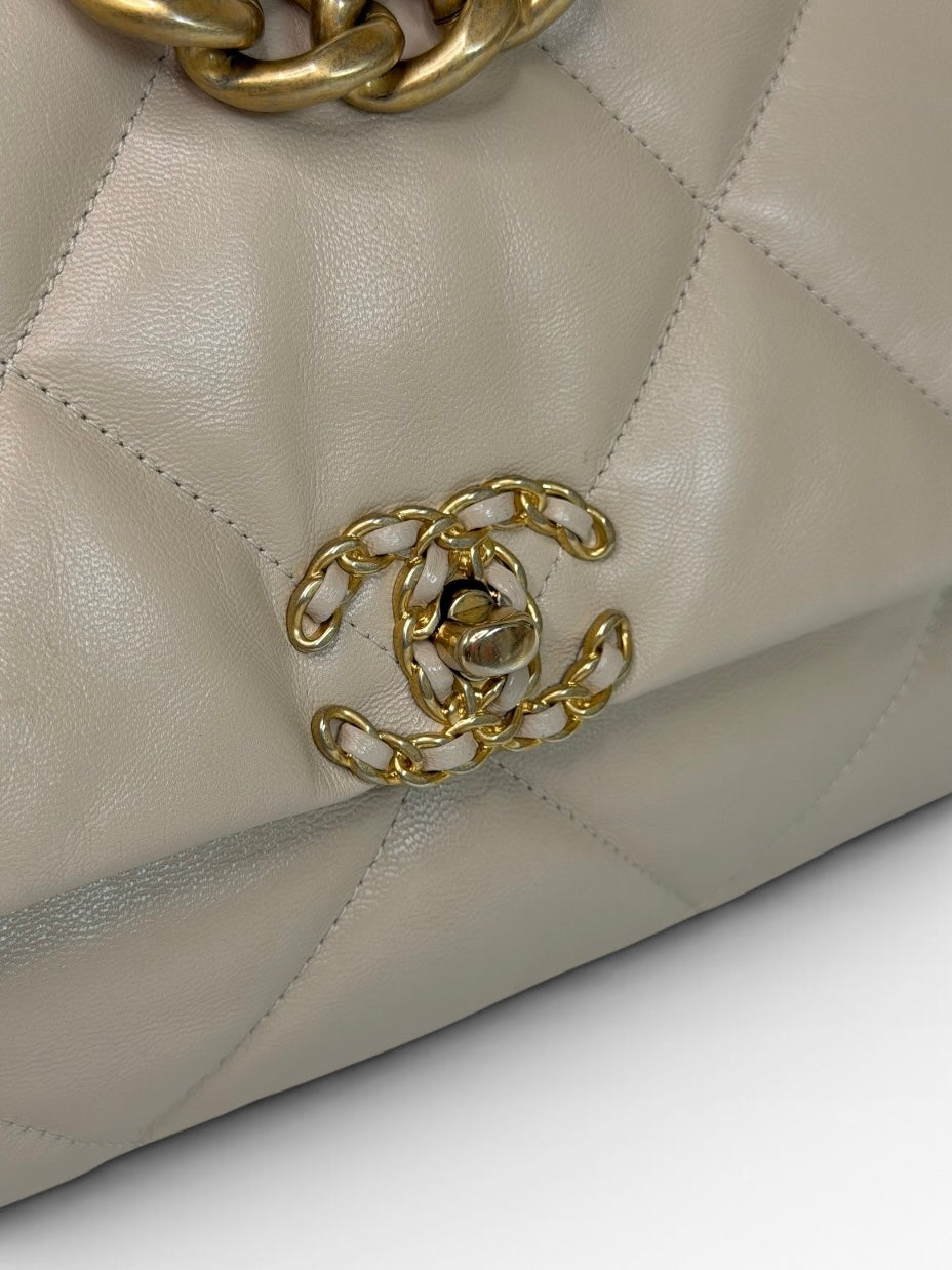 Chanel 19 Maxi In Cream Lambskin Leather With Mixed Hardware. 100% authentic and preloved in excellent condition