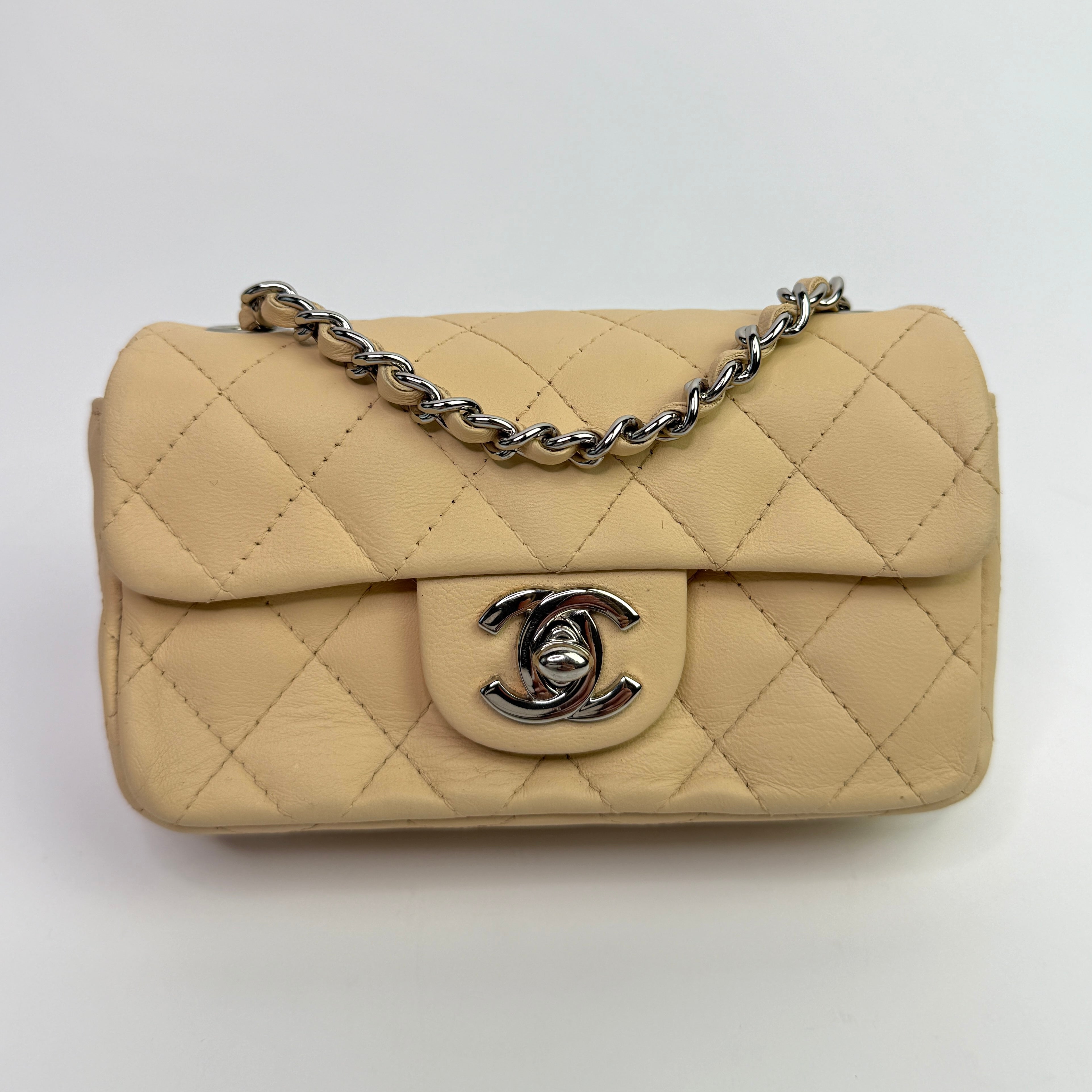 Chanel Super Mini Classic Flap Bag In Beige Lambskin With SHW