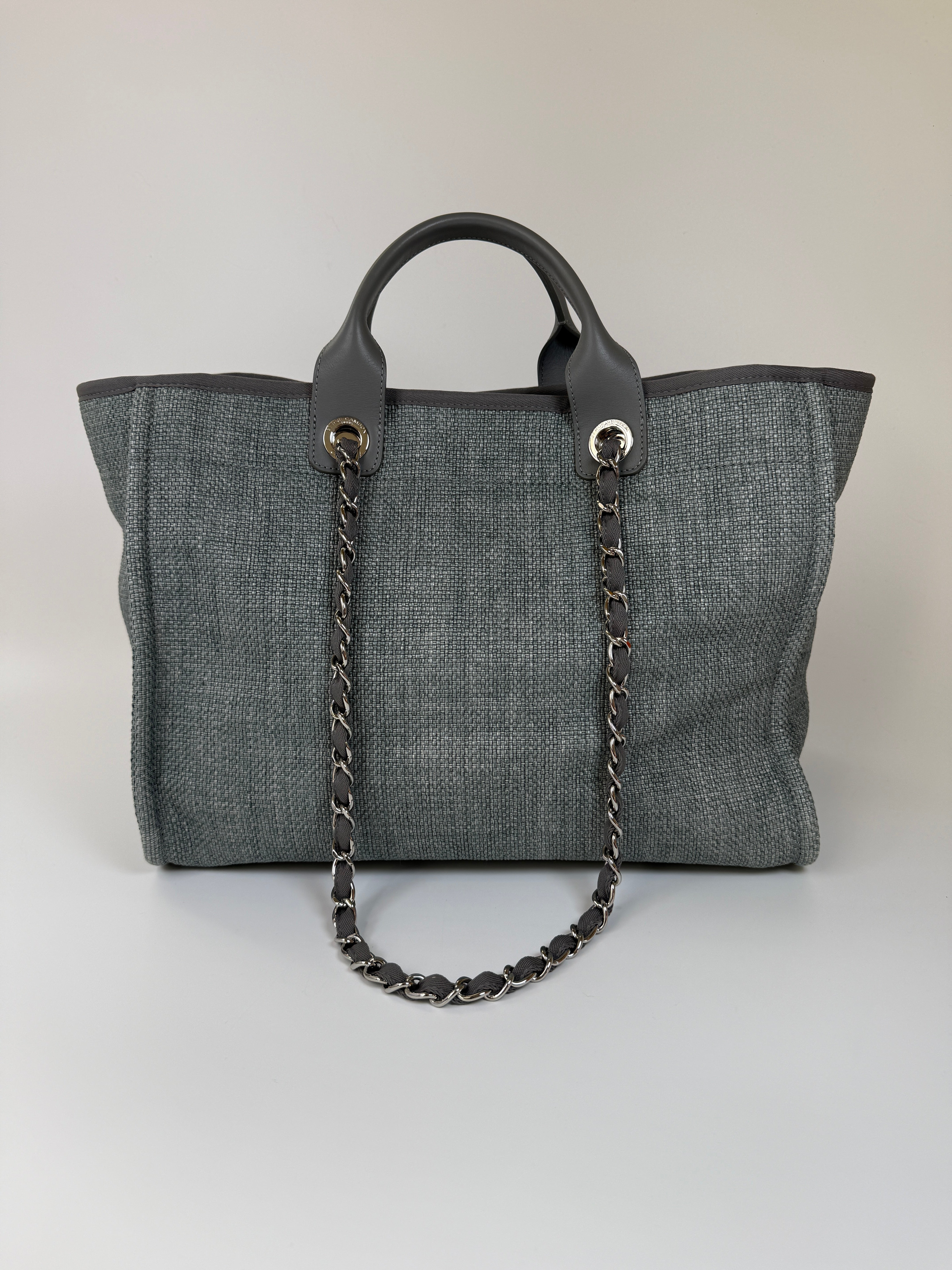 Authentic and preloved Chanel Medium Deauville Tote Bag In Mixed Fibers Rafia Silver Hardware. Excellent condition. 100% Authenticity guarantee