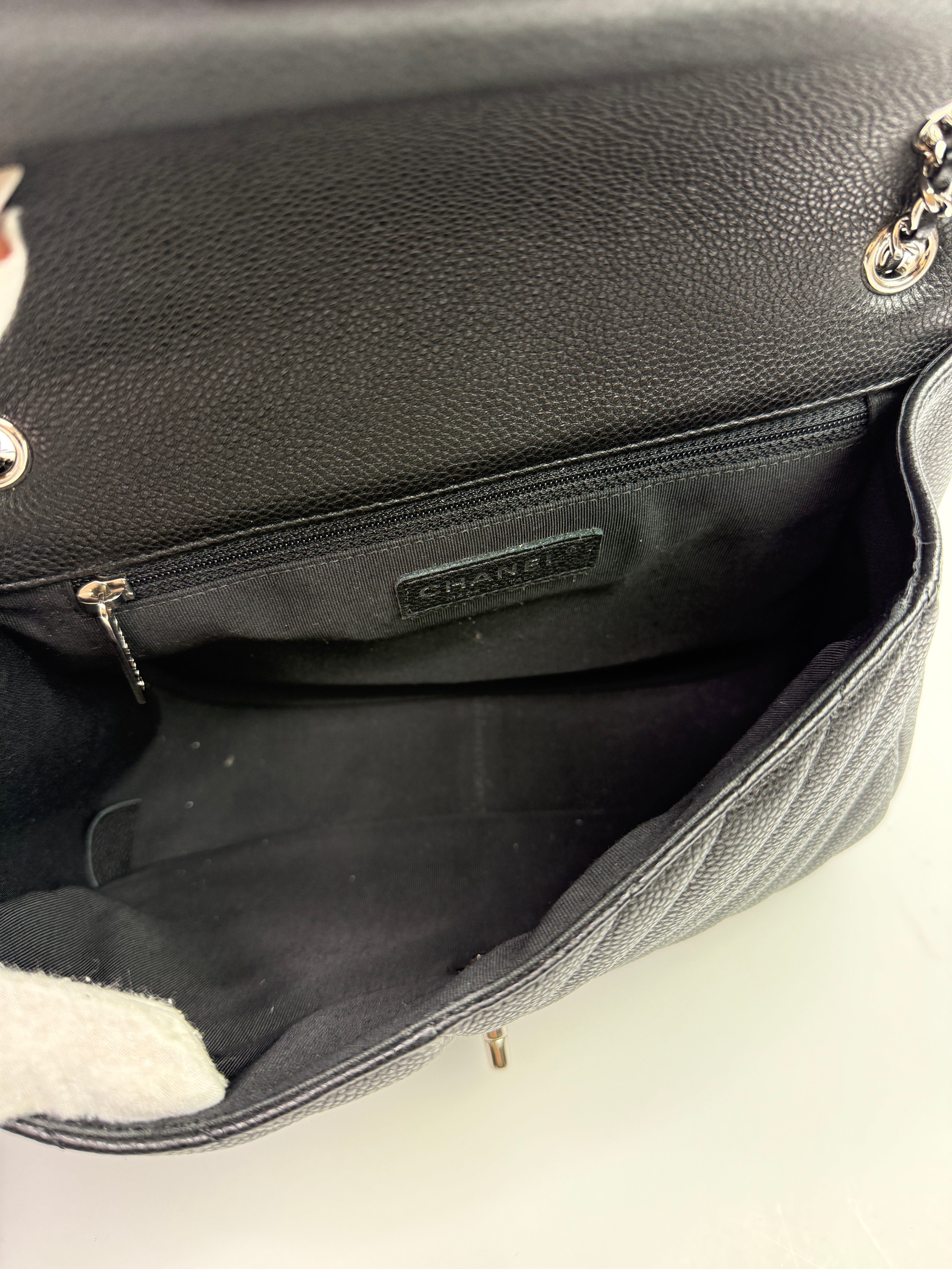 Chanel Seasonal Flap Bag In Black Chevron Caviar Leather With SHW