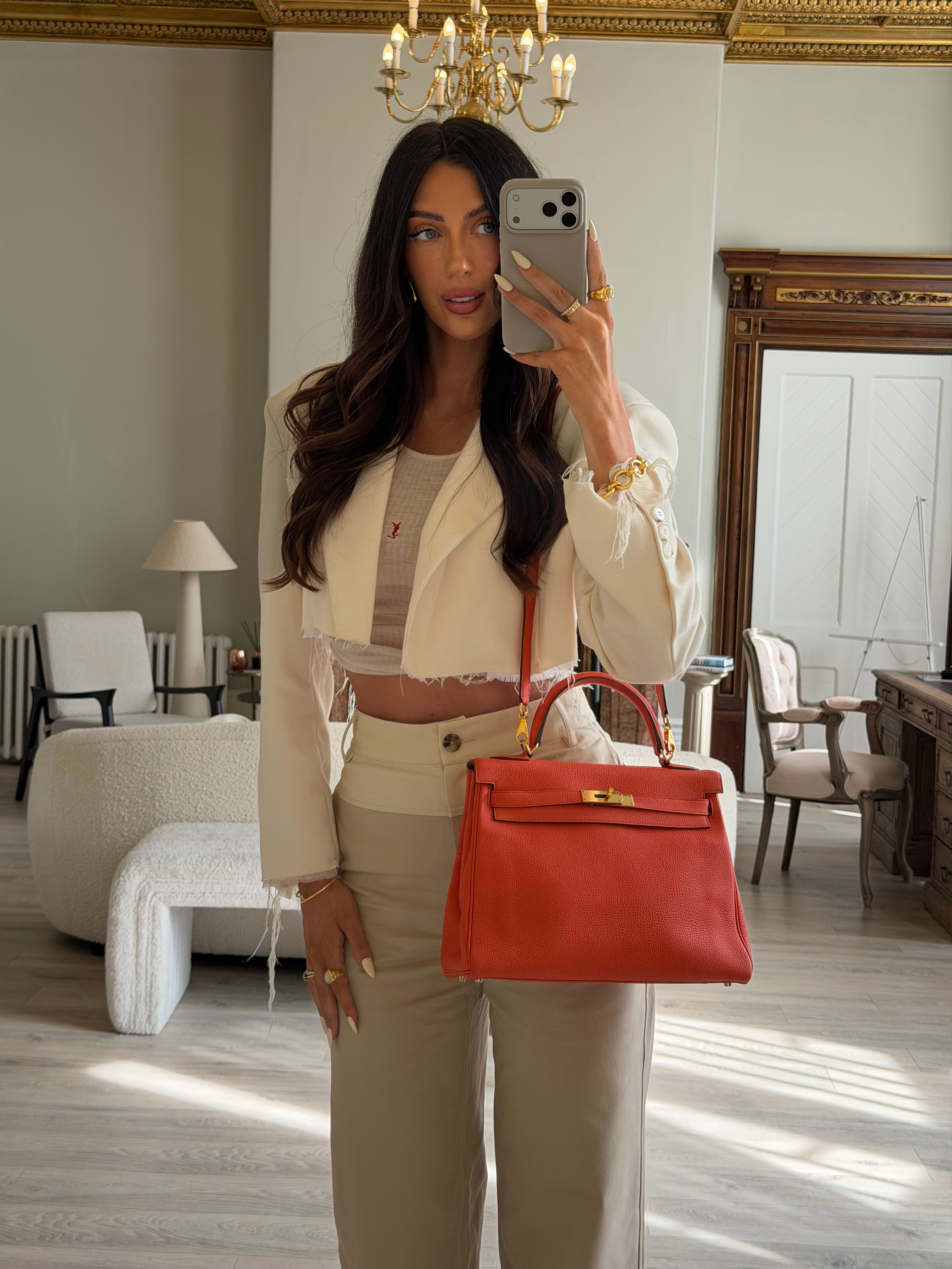 Authentic and preloved Hermès Kelly 28 In Cappucine Togo Leather Gold Hardware. Very Good Condition. 100% Authenticity guarantee