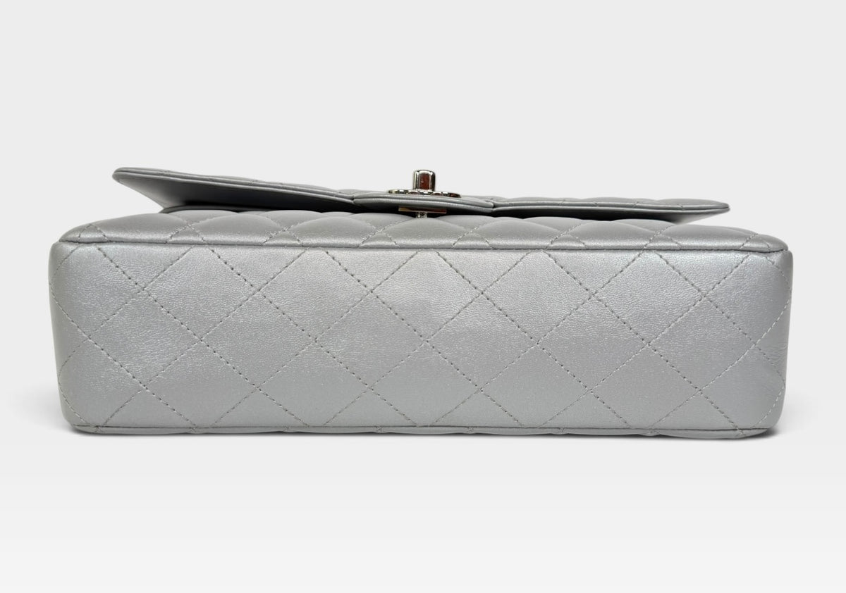 Chanel Medium Classic Double Flap In Silver Lambskin Leather Silver Hardware. 100% authentic and preloved in excellent condition