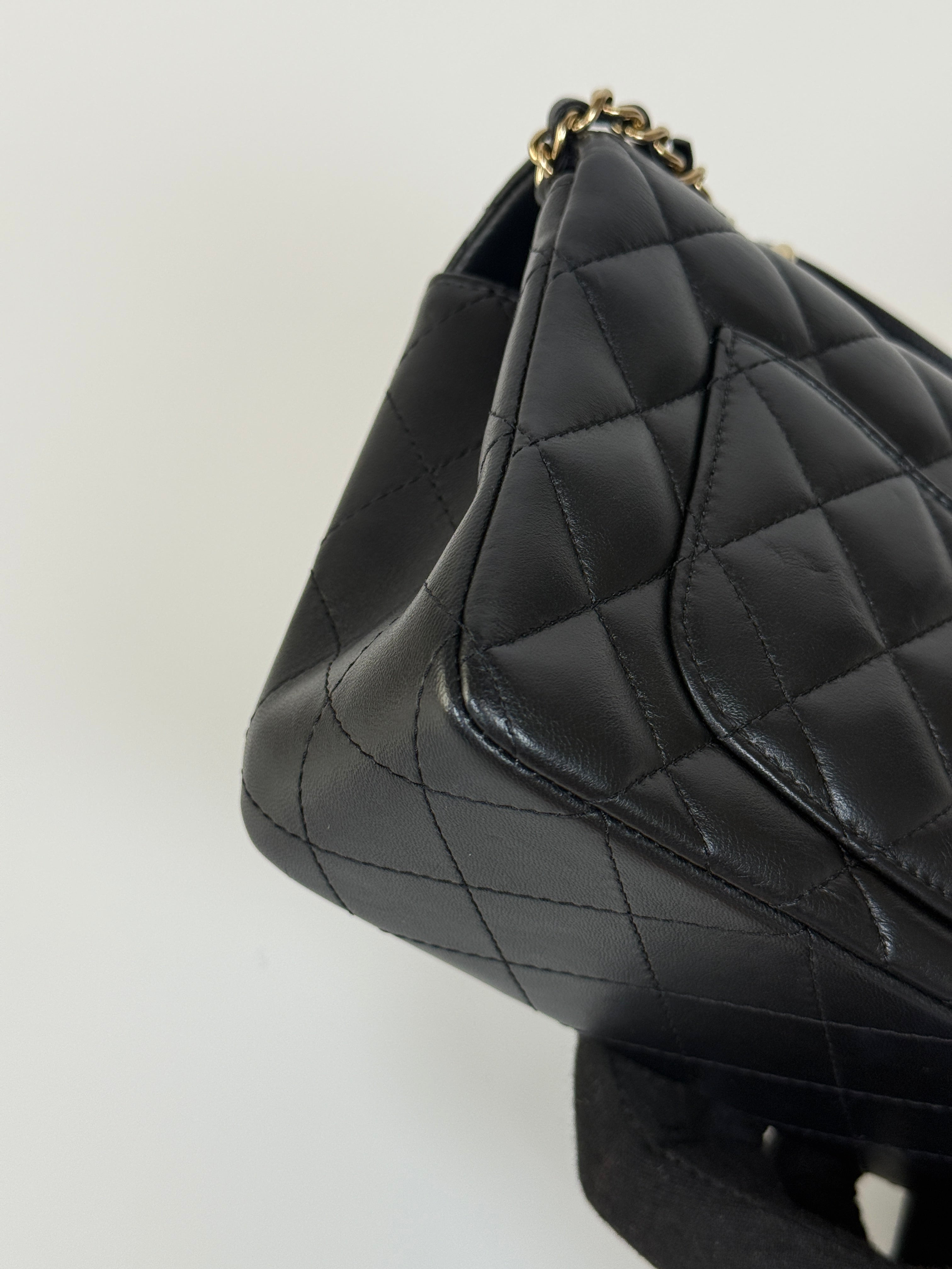 Authentic and preloved Chanel Mini Rectangle Top Handle Flap Bag In Black Lambskin With Gold hardware. Excellent Condition. 100% Authenticity guarantee