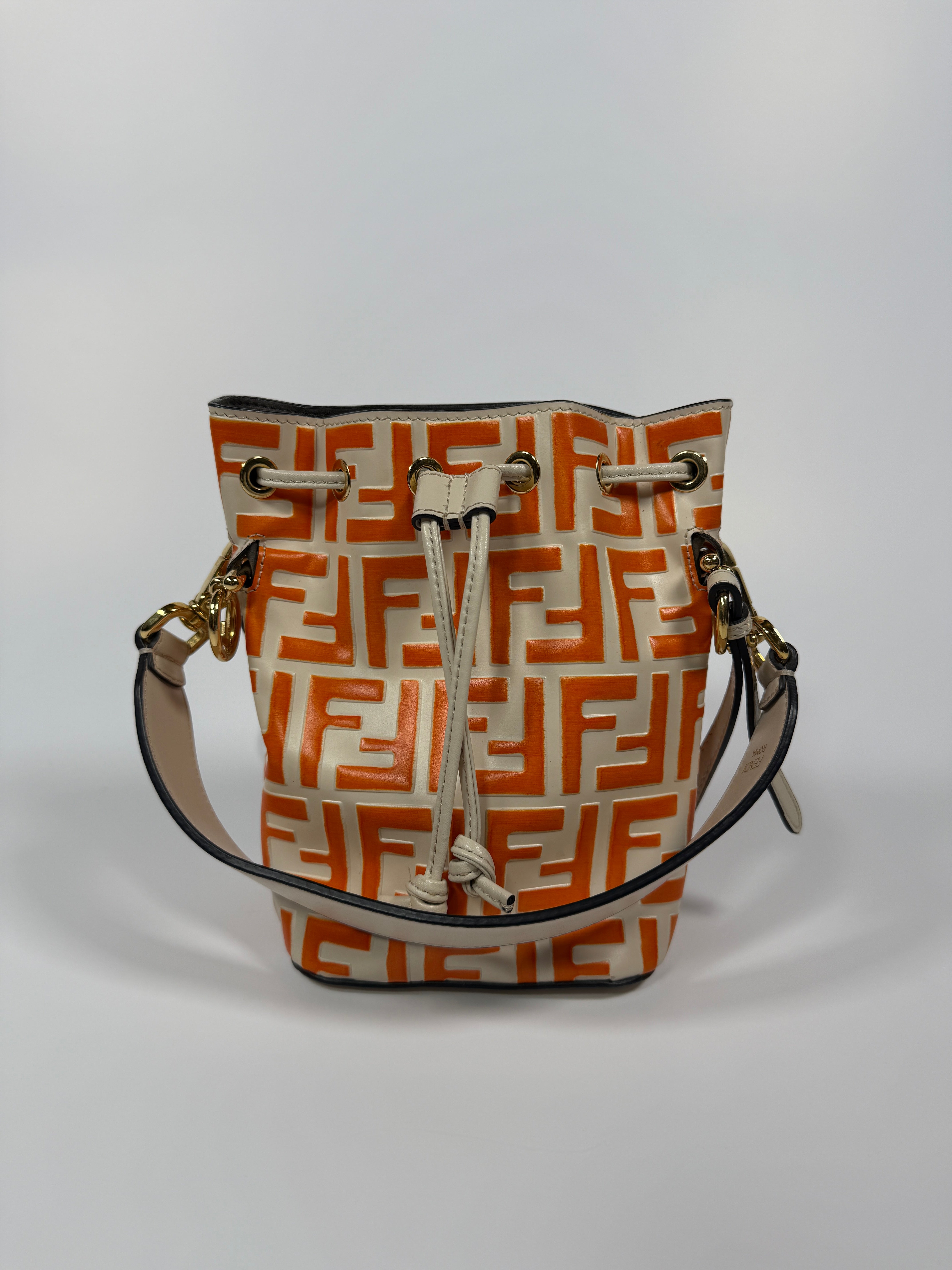 Authentic and pre loved Fendi Mini Mon Tresor Bucket Bag orange In Very Good Condition