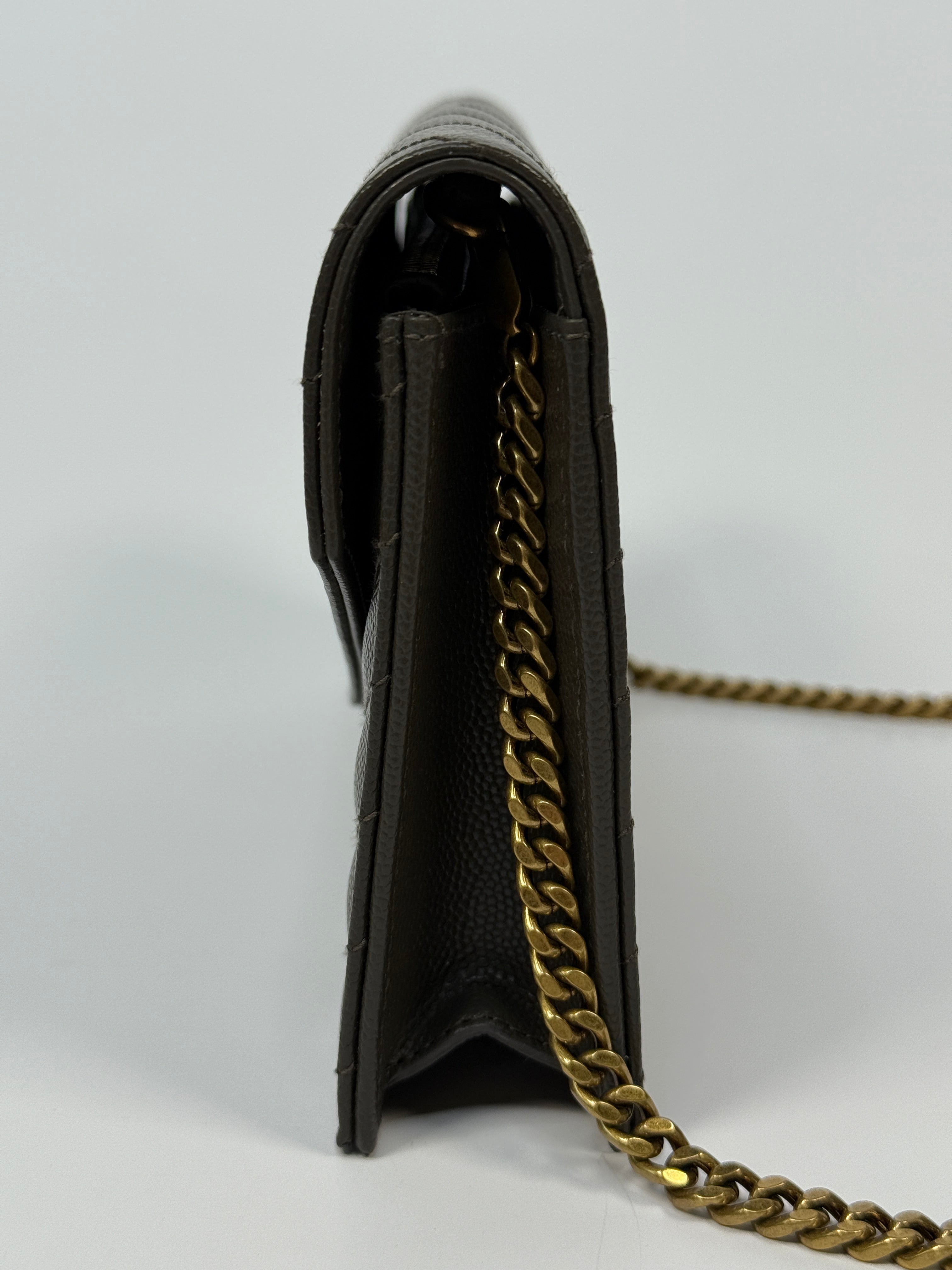 Saint Laurent Cassandre Matelassé Textured- Leather Wallet On Chain In Khaki With Gold Hardware. Authentic and preloved. Excellent condition. 100% Authenticity guarantee