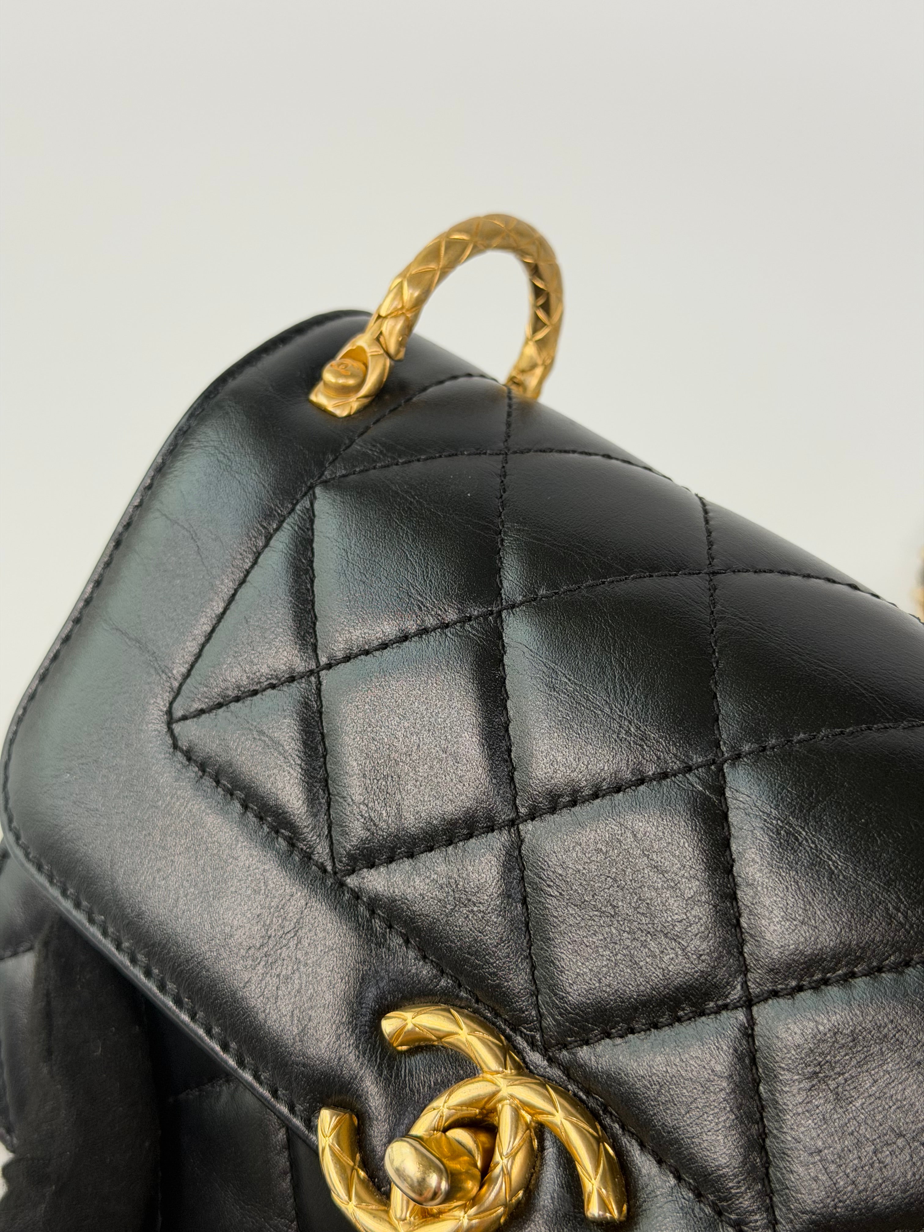 Chanel Mini Perfect Fit Flap In Black Lambskin With Antique Gold Hardware 100% authentic and preloved in excellent condition