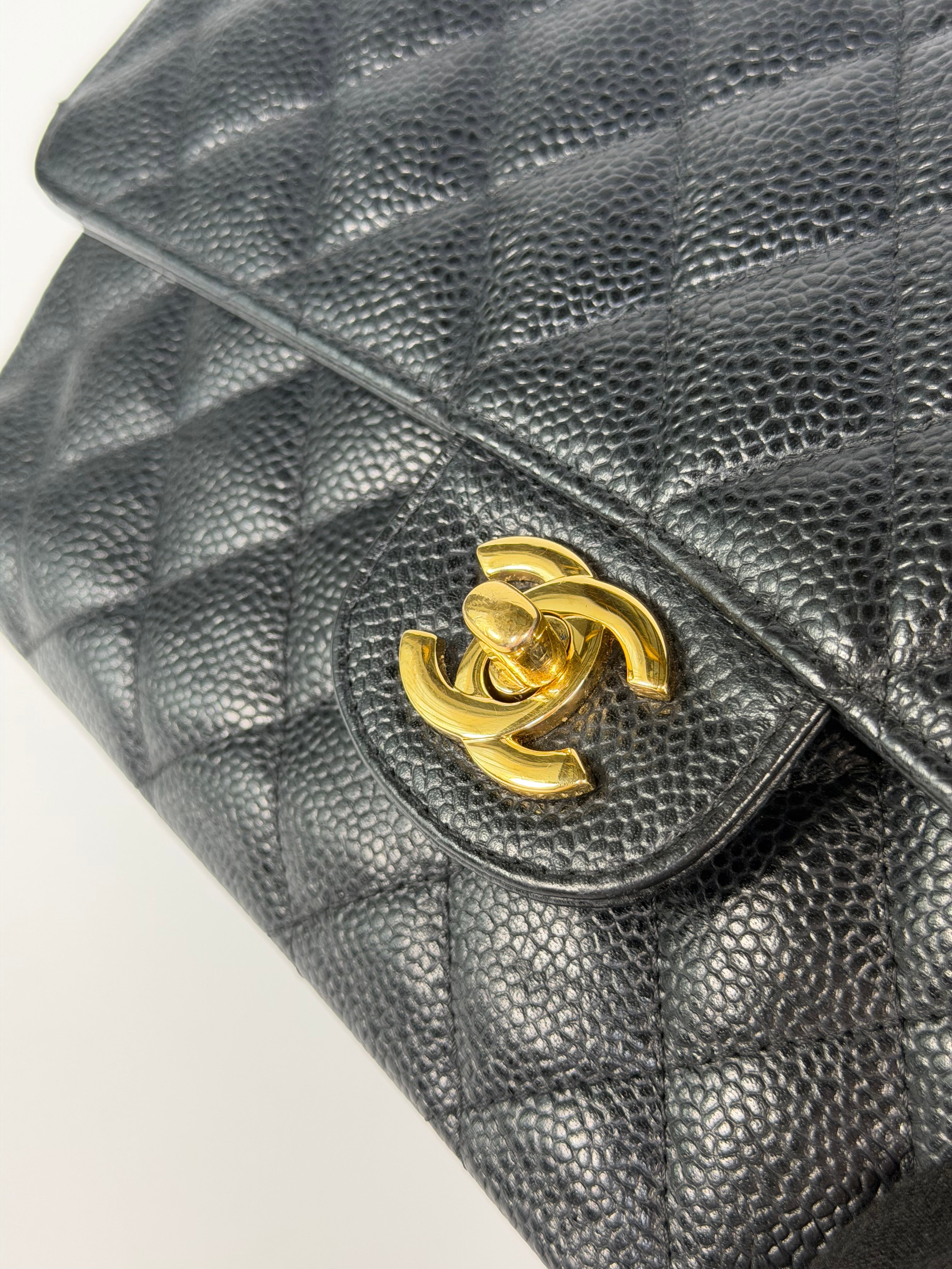 Chanel Medium Classic Double Flap In Black Caviar Leather Gold Hardware. 100% authentic and preloved in excellent condition
