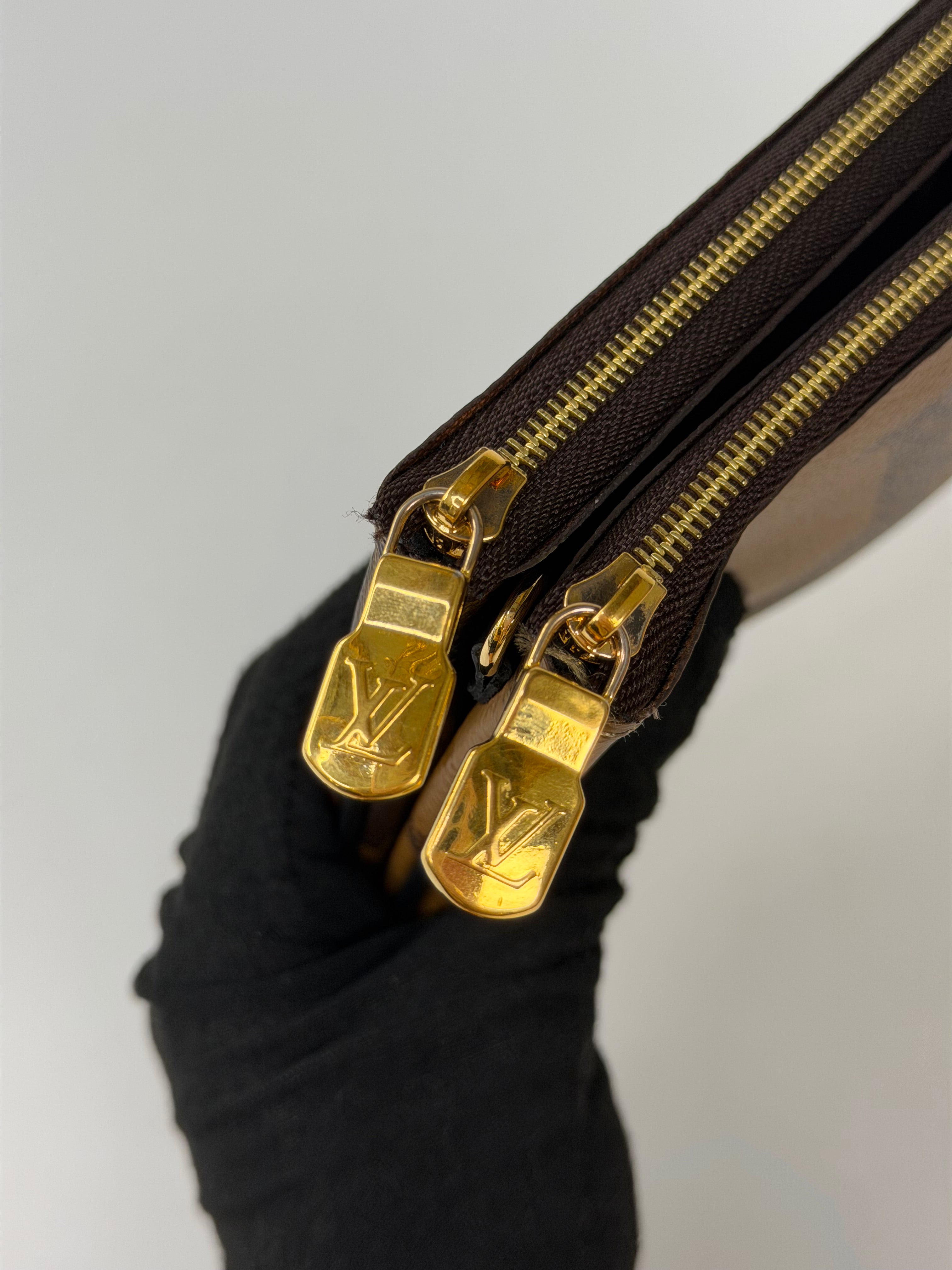 Louis Vuitton Double Zip Pochette In Monogram Canvas in excellent condition 100% authentic and preloved