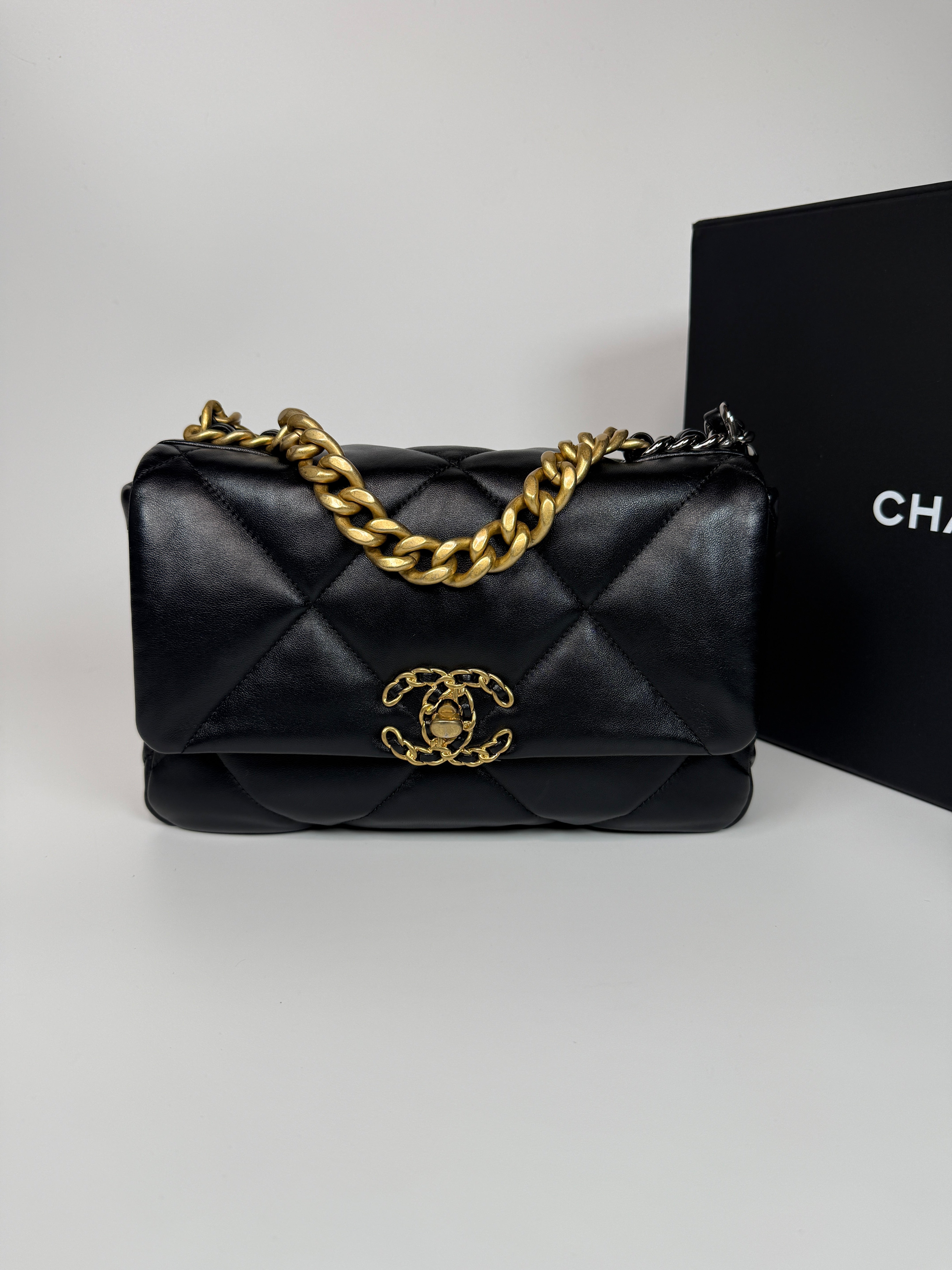 Authentic and preloved Chanel 19 Small In Black Lambskin Leather Mixed hardware. Excellent condition. 100% Authenticity guarantee