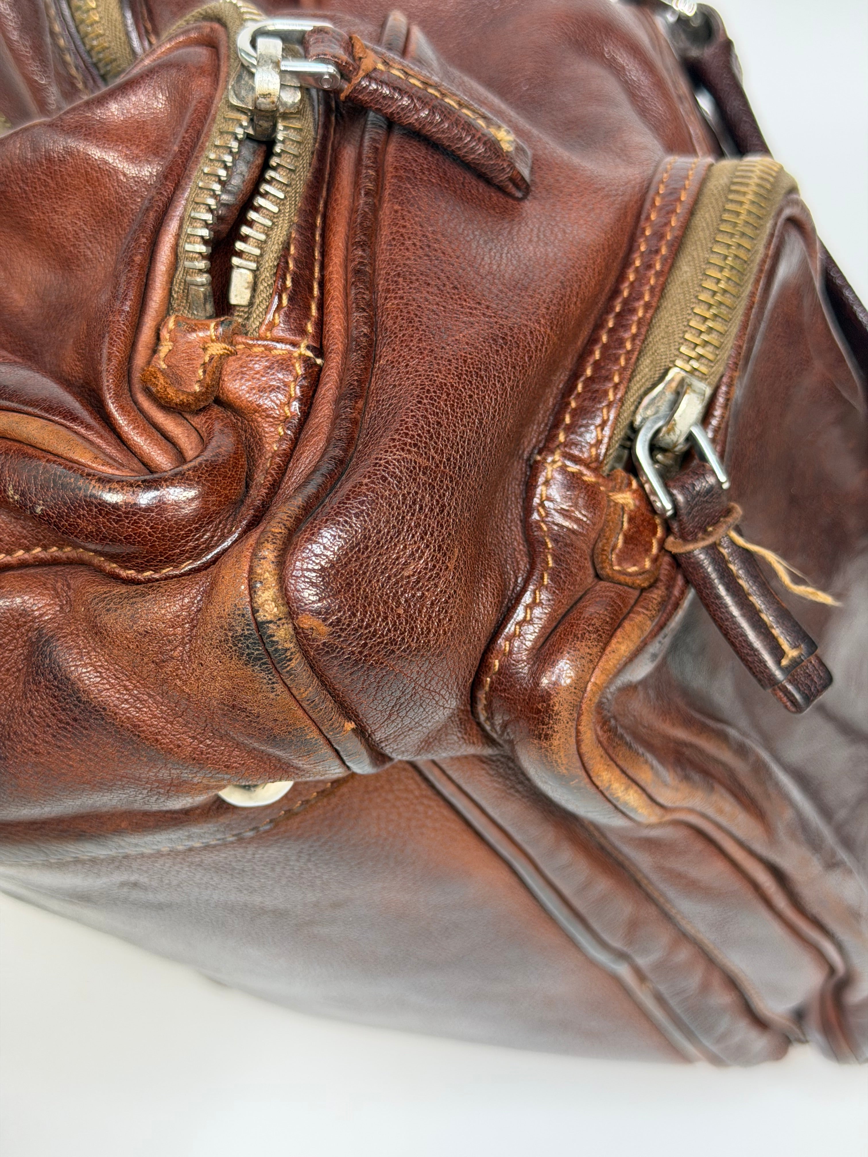 Prada Washed Bauletto Shoulder Bag In Brown Leather With Gold Hardware. Authentic and preloved in very good condition