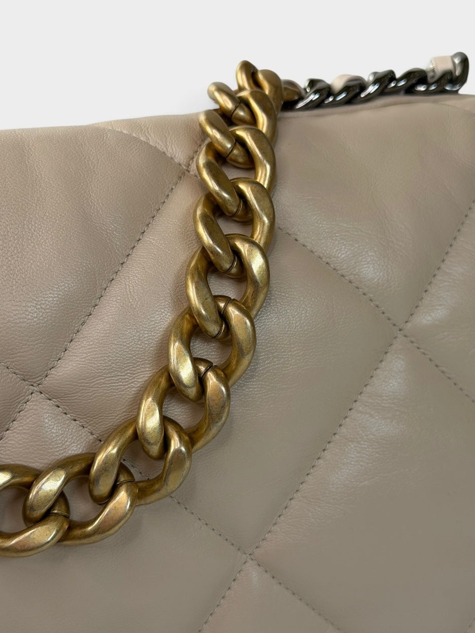 Chanel 19 Maxi In Cream Lambskin Leather With Mixed Hardware. 100% authentic and preloved in excellent condition