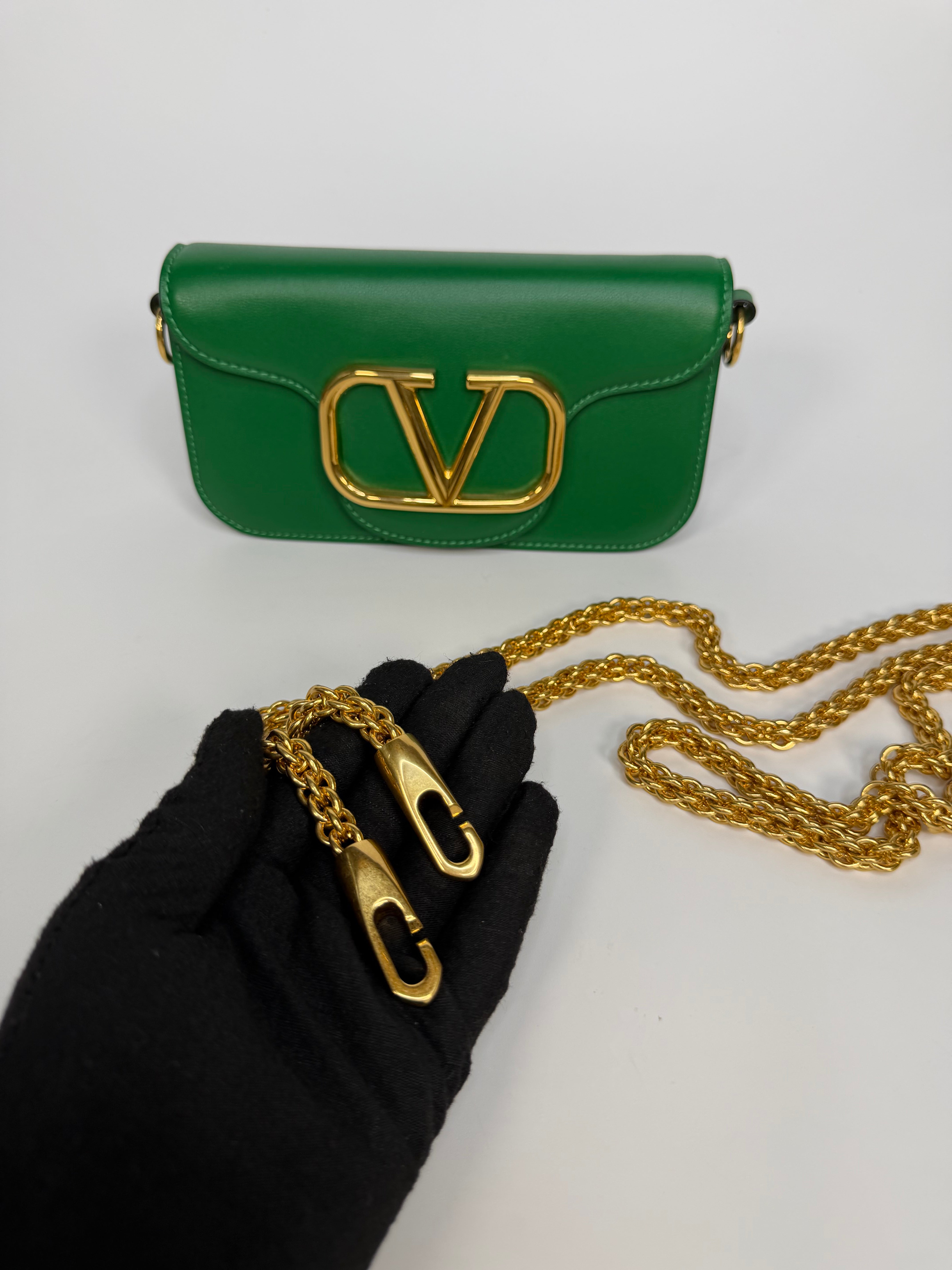 Valentino Garavani Locò Small Shoulder Bag In Green Leather With Gold Hardware. Authentic and preloved in excellent condition