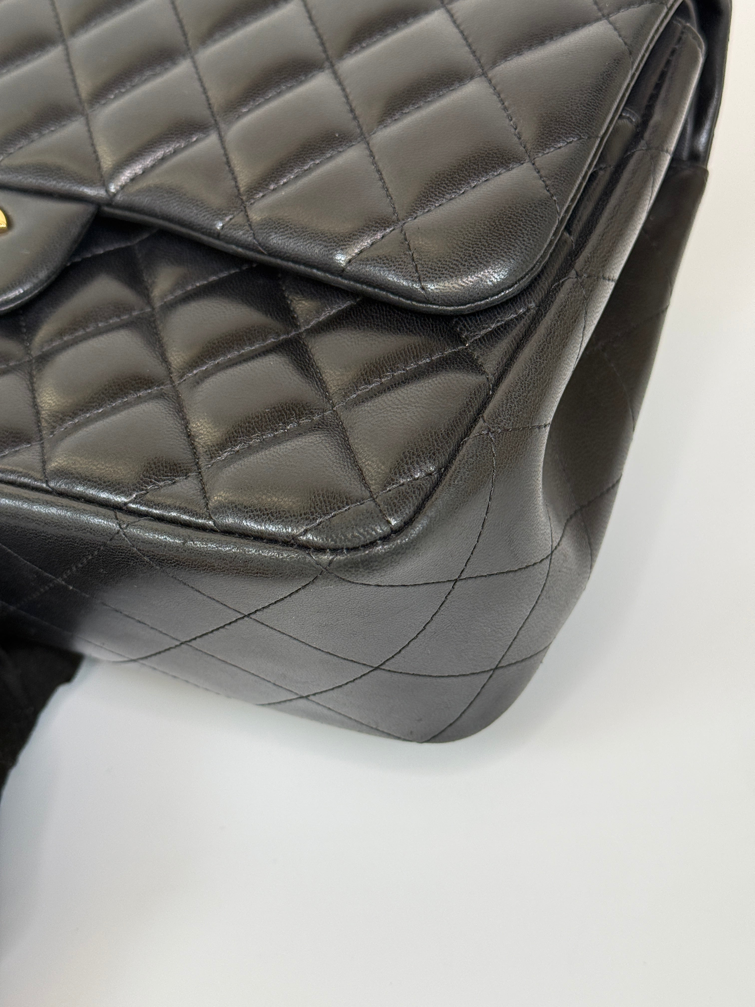 Authentic and preloved Chanel Jumbo Classic Flap Bag In Black Lambskin Leather With GOLD Hardware. Excellent condition. 100% Authenticity Guarantee