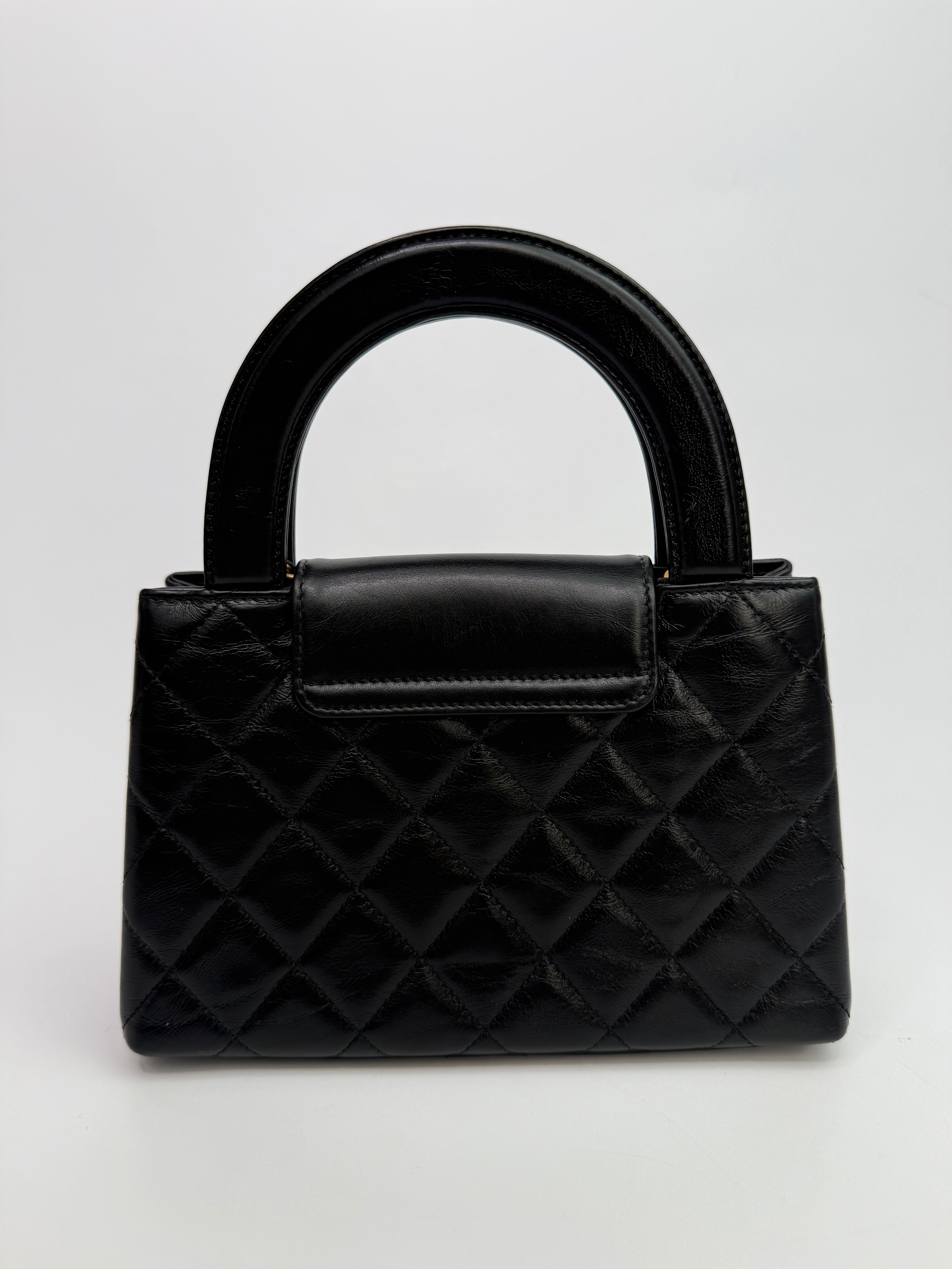 Chanel Mini Kelly Bag In Black Calfskin Leather with Gold Hardware
Pre Loved & Authentic