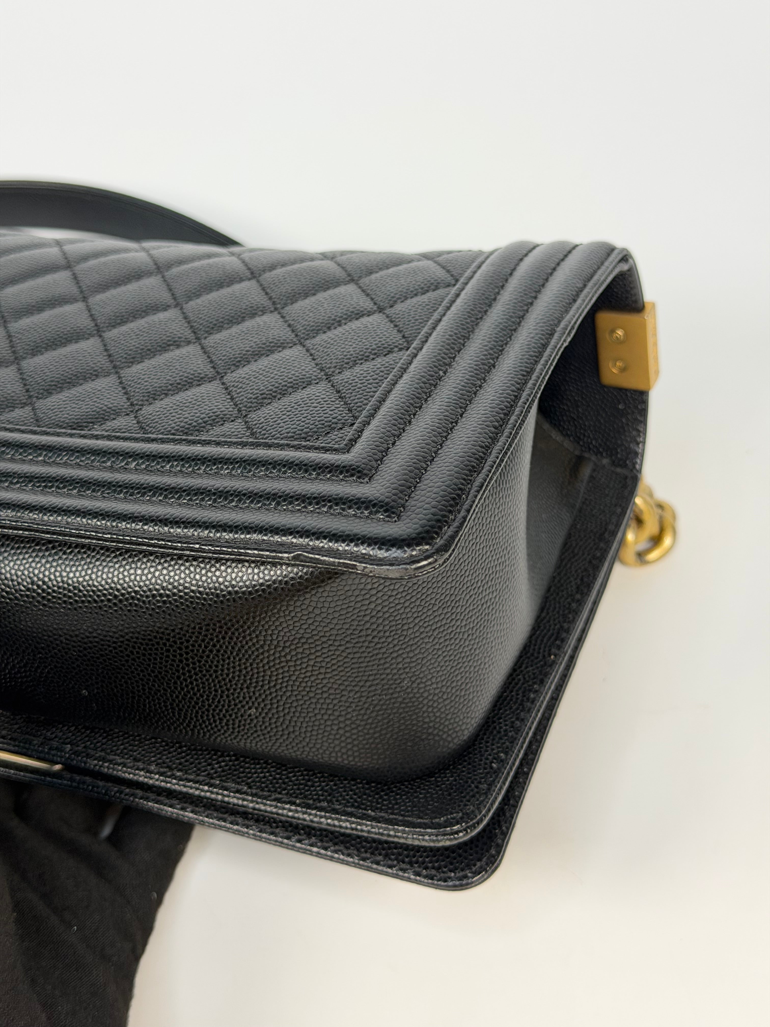 Chanel Boy Bag In Black Caviar Leather With Gold Hardware. Authentic and preloved in excellent condition. Insured next day delivery. Verified by Luxe Cheshire