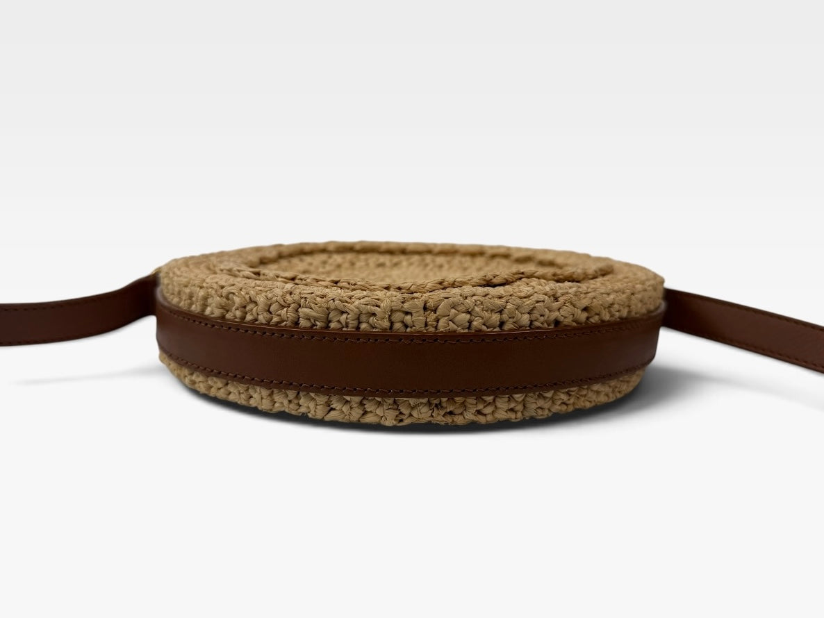 Saint Laurent Round Raffia Crossbody Bag With Gold Hardware. 100% authentic and preloved in excellent condition