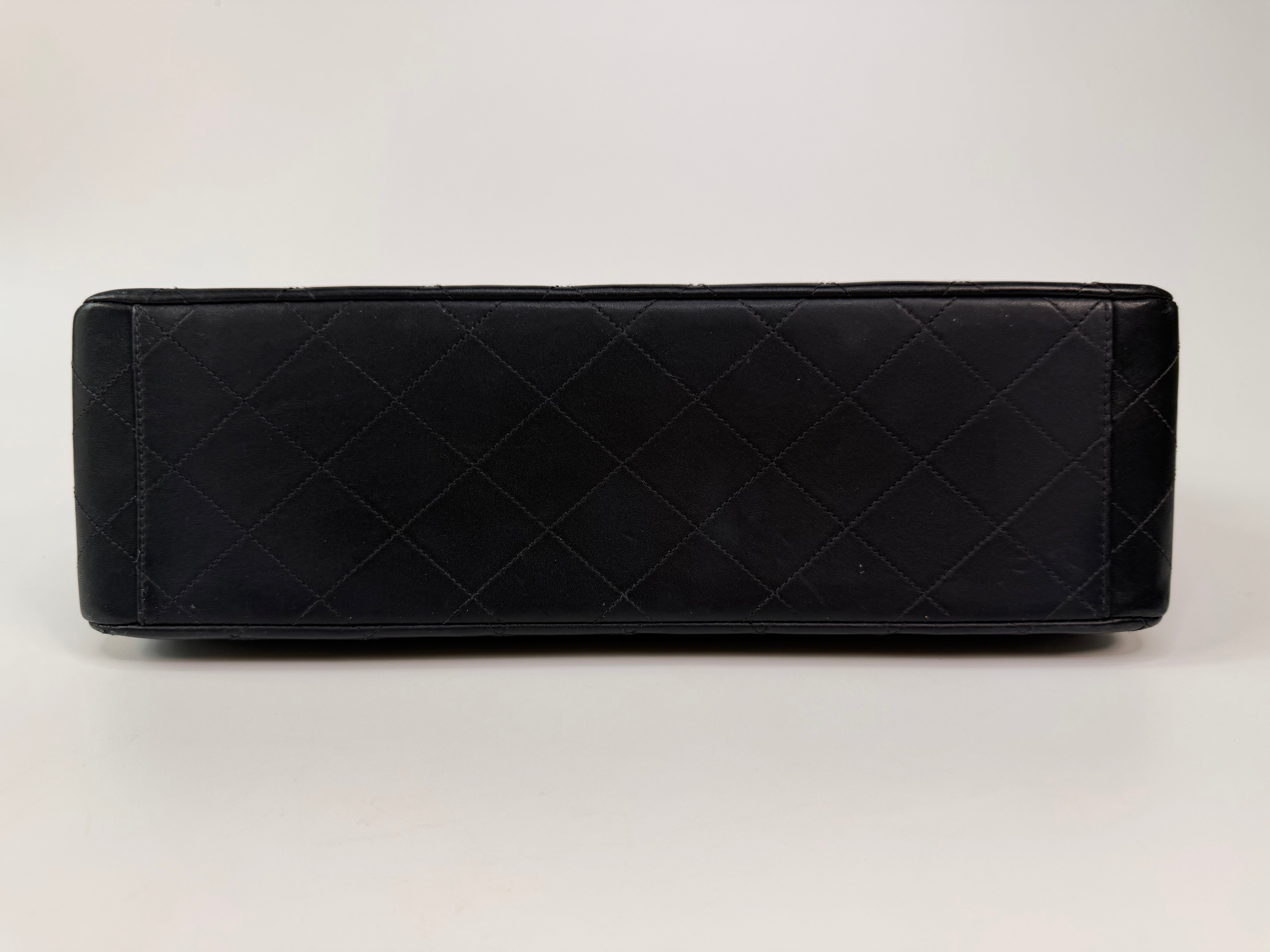 Chanel Vintage XL Maxi Flap Bag In Black Lambskin Gold Hardware. 100% authentic and preloved in excellent condition