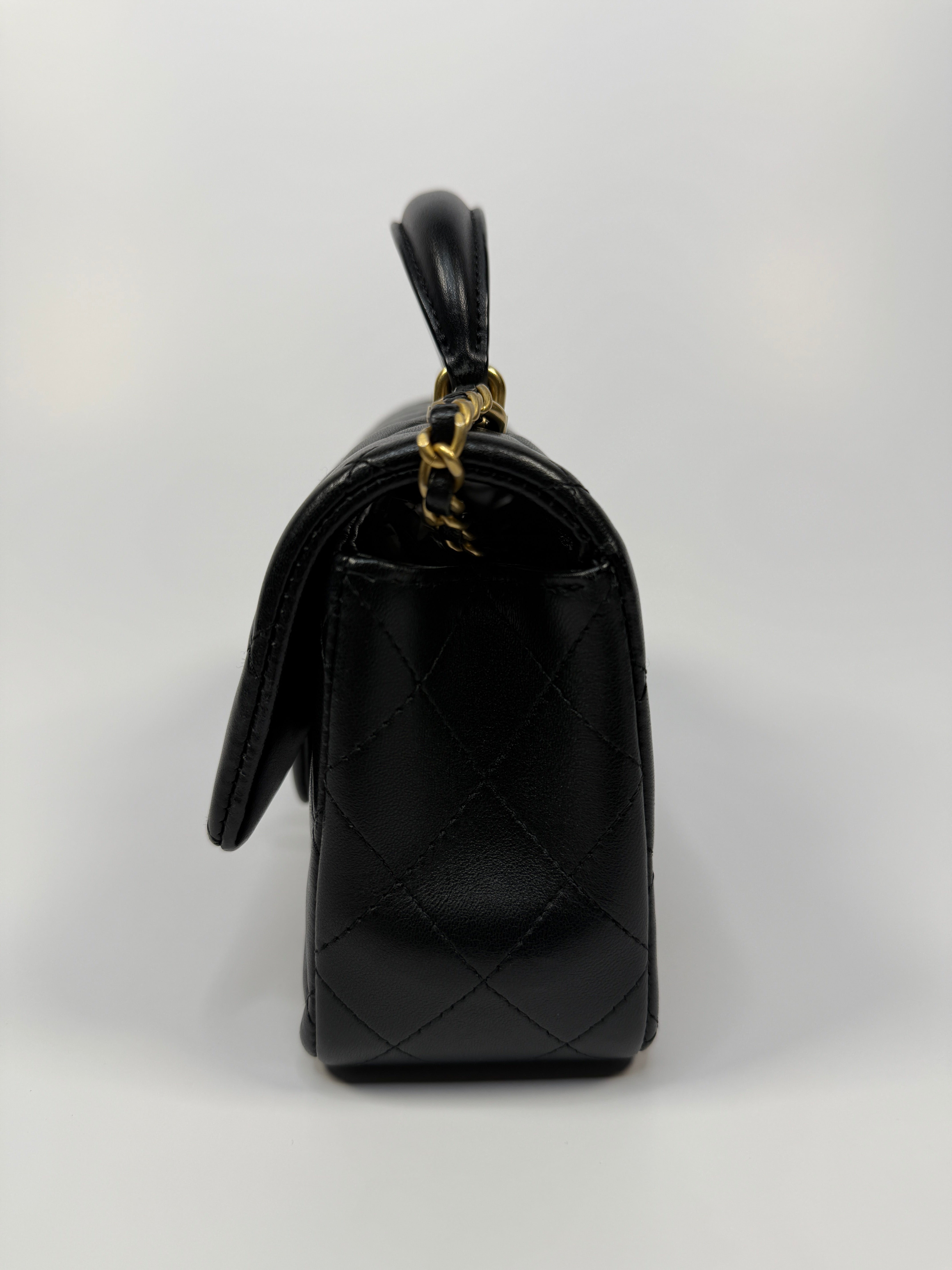Chanel Mini Rectangle Top Handle Flap Bag In Black Lambskin With Gold Hardware
Pre Loved & Authentic