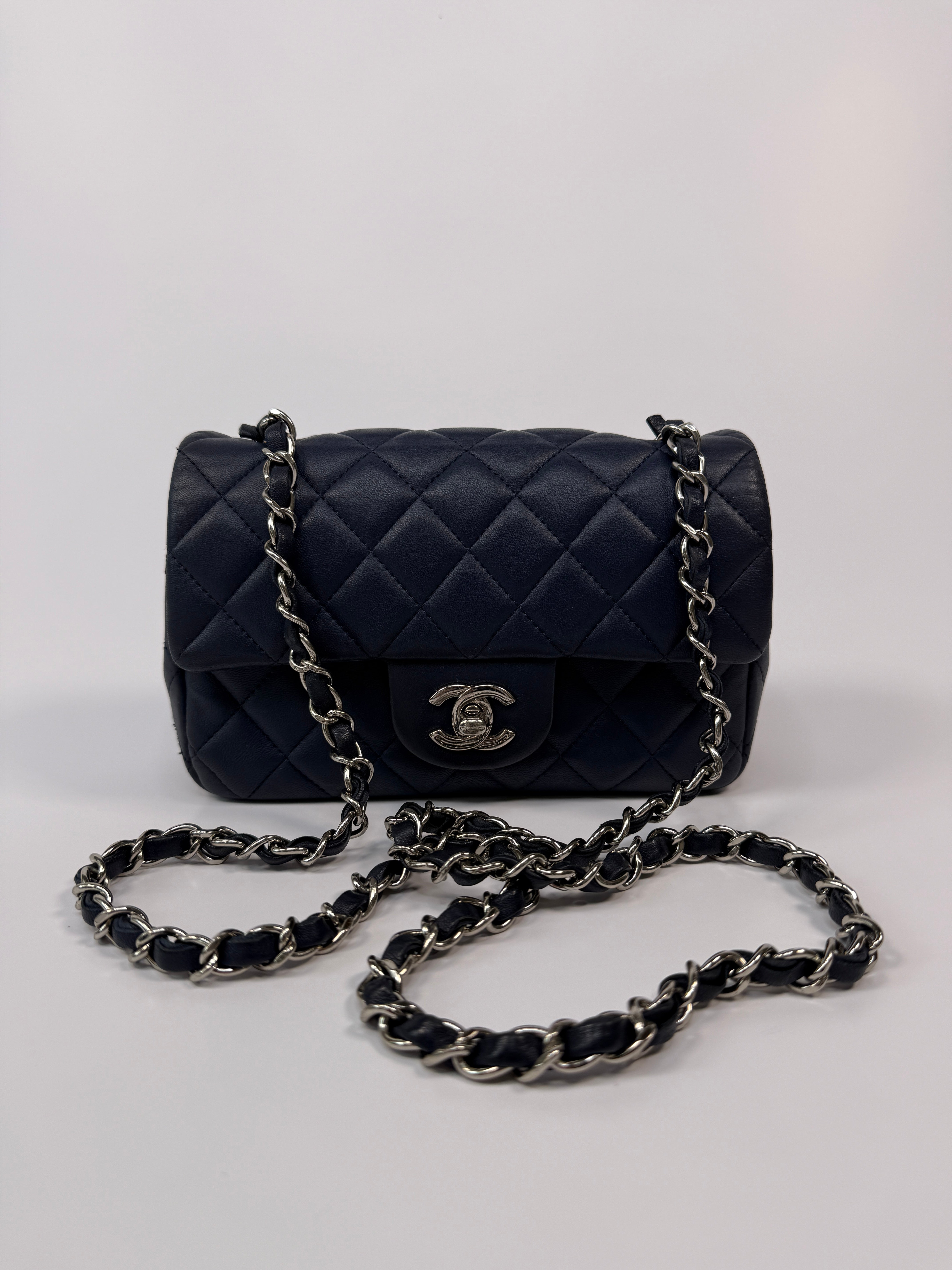 Chanel Mini Rectangle Flap Bag In Navy Lambskin With Silver Hardware
Pre Loved & Authentic