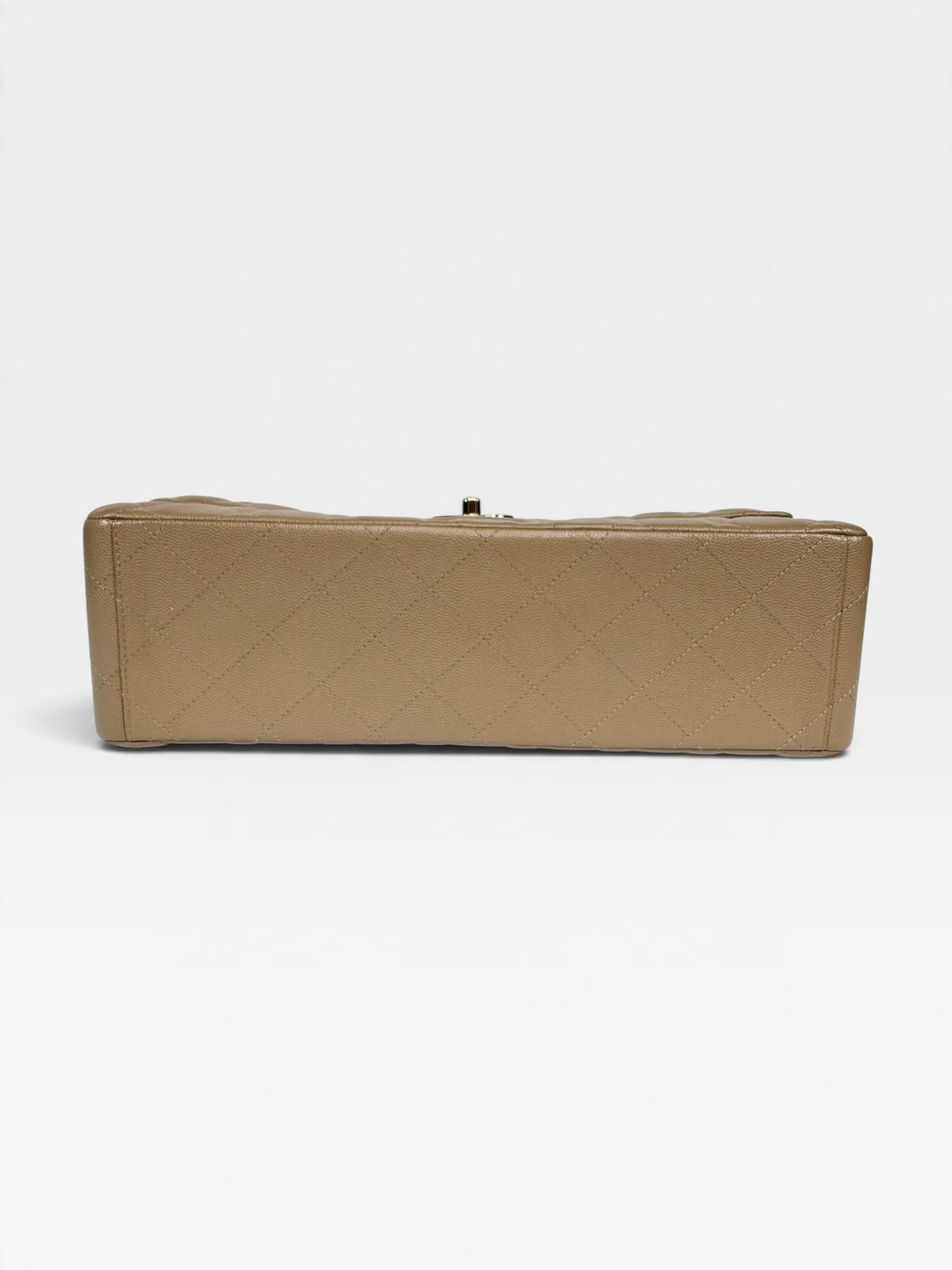 Chanel Maxi Flap In Beige Caviar Leather With Gold Hardware. 100% authentic and pre loved in excellent condition.