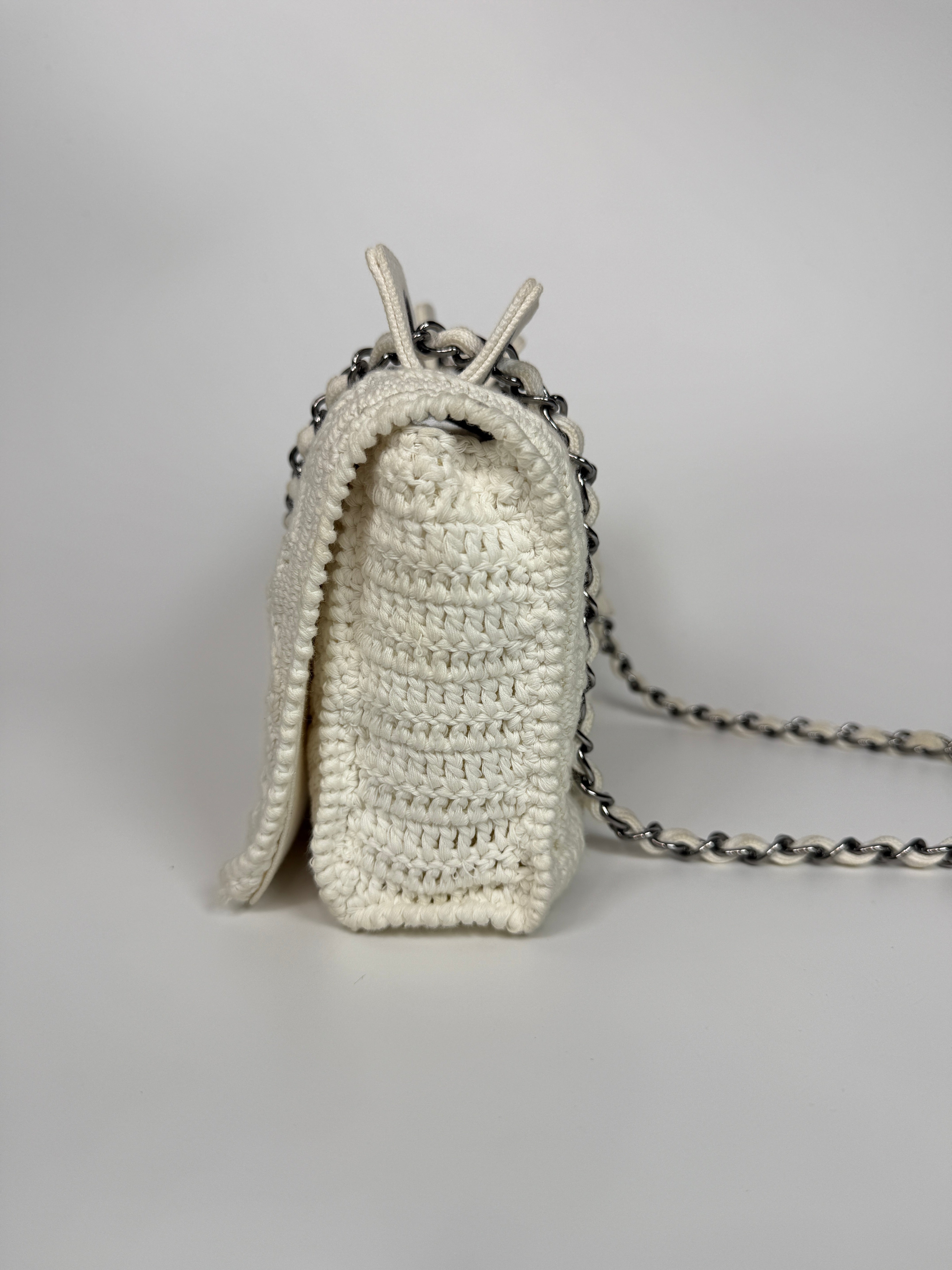 Authentic and preloved Chanel Vintage White Crotchet Flap Bag With Silver hardware. Good condition. 100% Authenticity guarantee