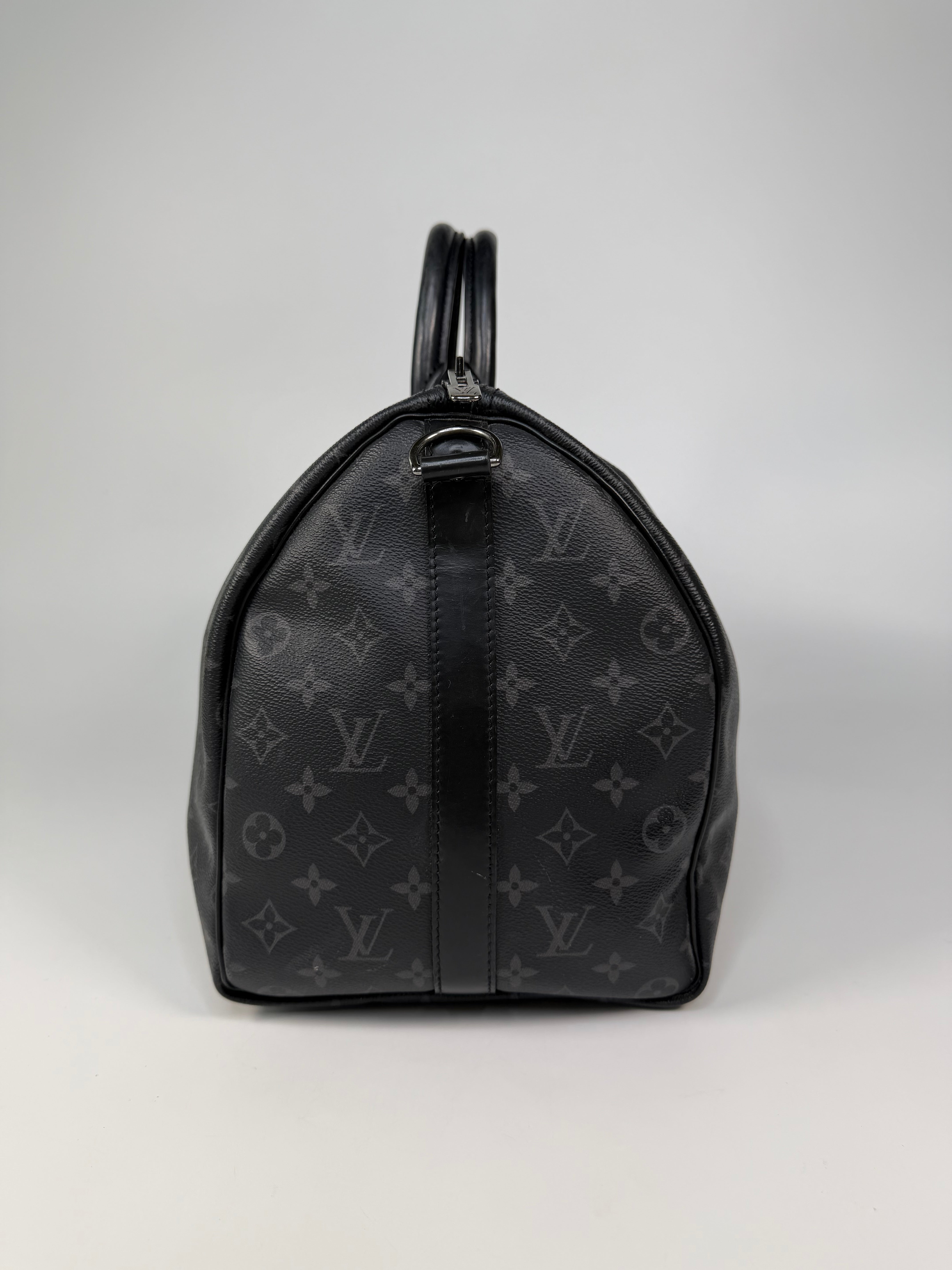 Louis Vuitton Keepall Bandouliere 45 Monogram Eclipse Canvas. 100% authentic and preloved in excellent condition.