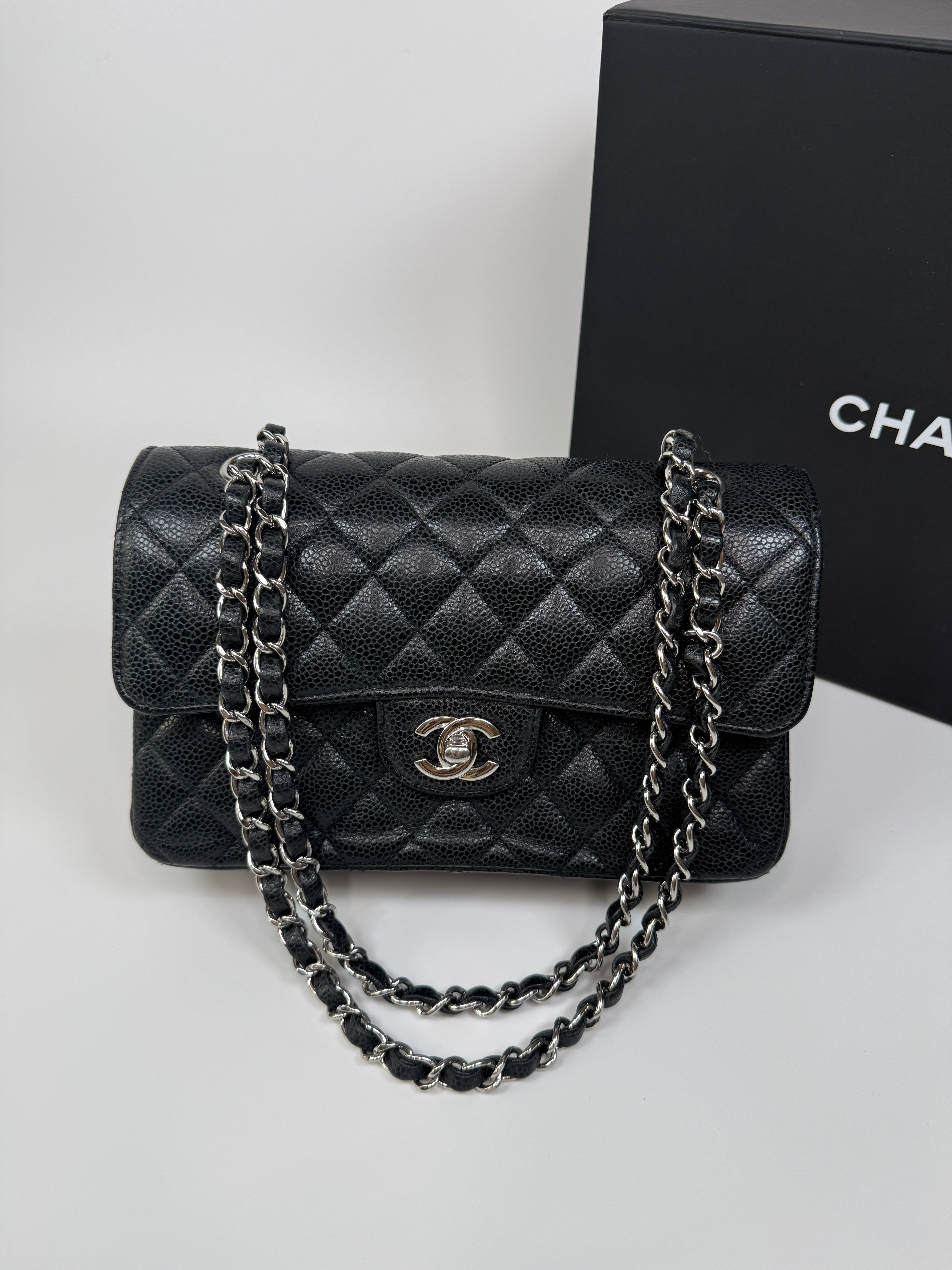 Chanel Small Classic Double Flap In Black Caviar Leather With Silver Hardware. Authentic and preloved in very good condition. 100% Authenticity guarantee