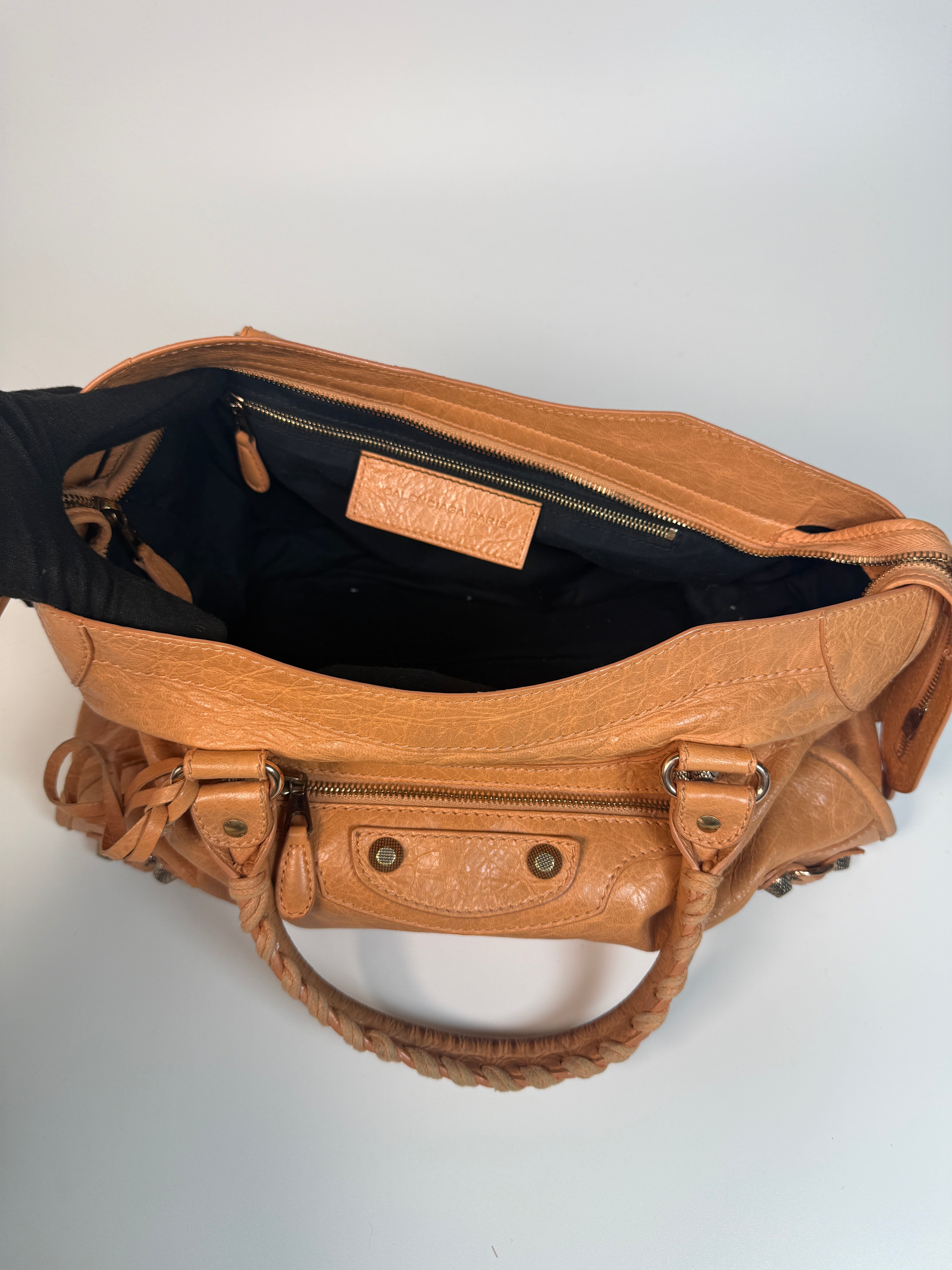 Authentic and preloved Balenciaga Medium Le City Bag In Peach Leather with silver hardware. Very good condition. 100% Authenticity guarantee.