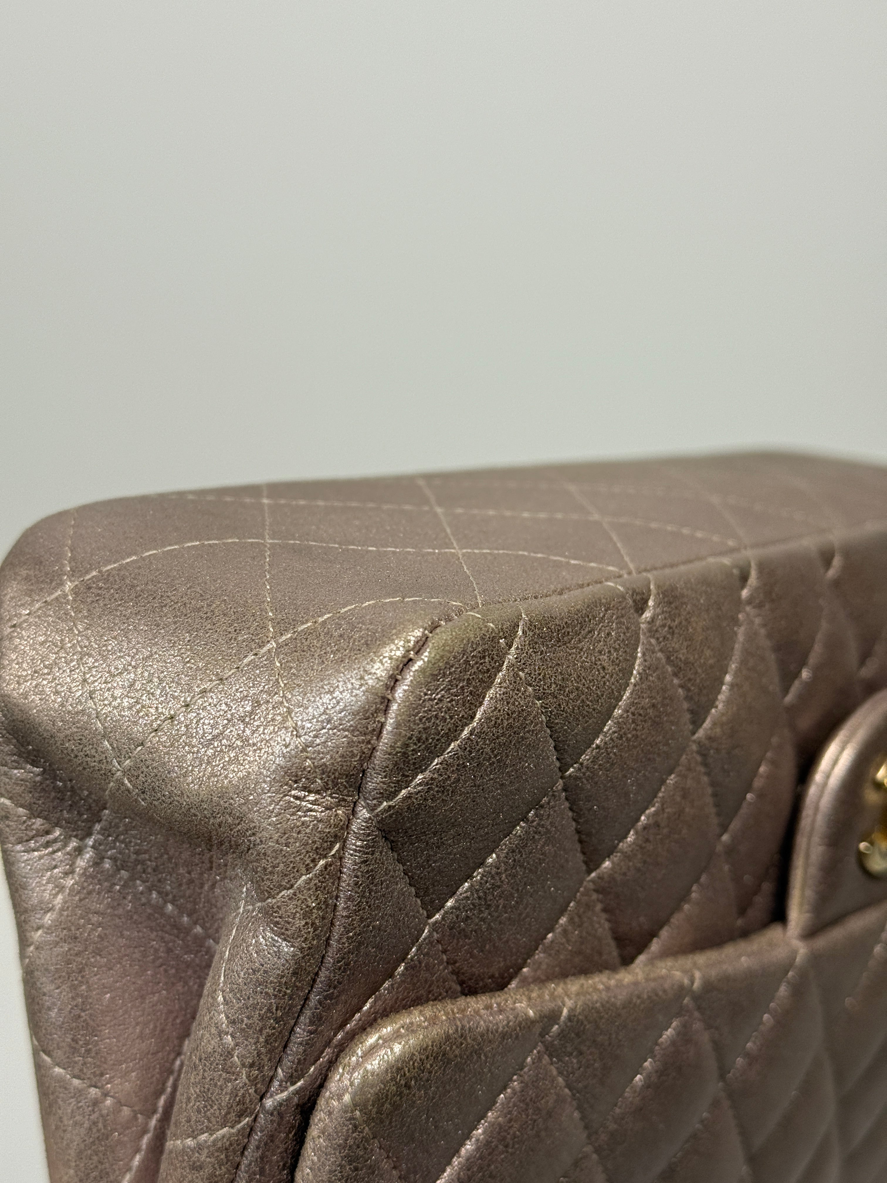 Authentic pre-loved Chanel Iridescent Rose Medium Classic Double Flap With Gold Hardware.