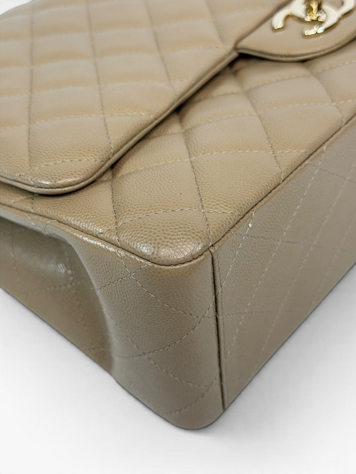 Chanel Maxi Flap In Beige Caviar Leather With Gold Hardware. 100% authentic and pre loved in excellent condition.