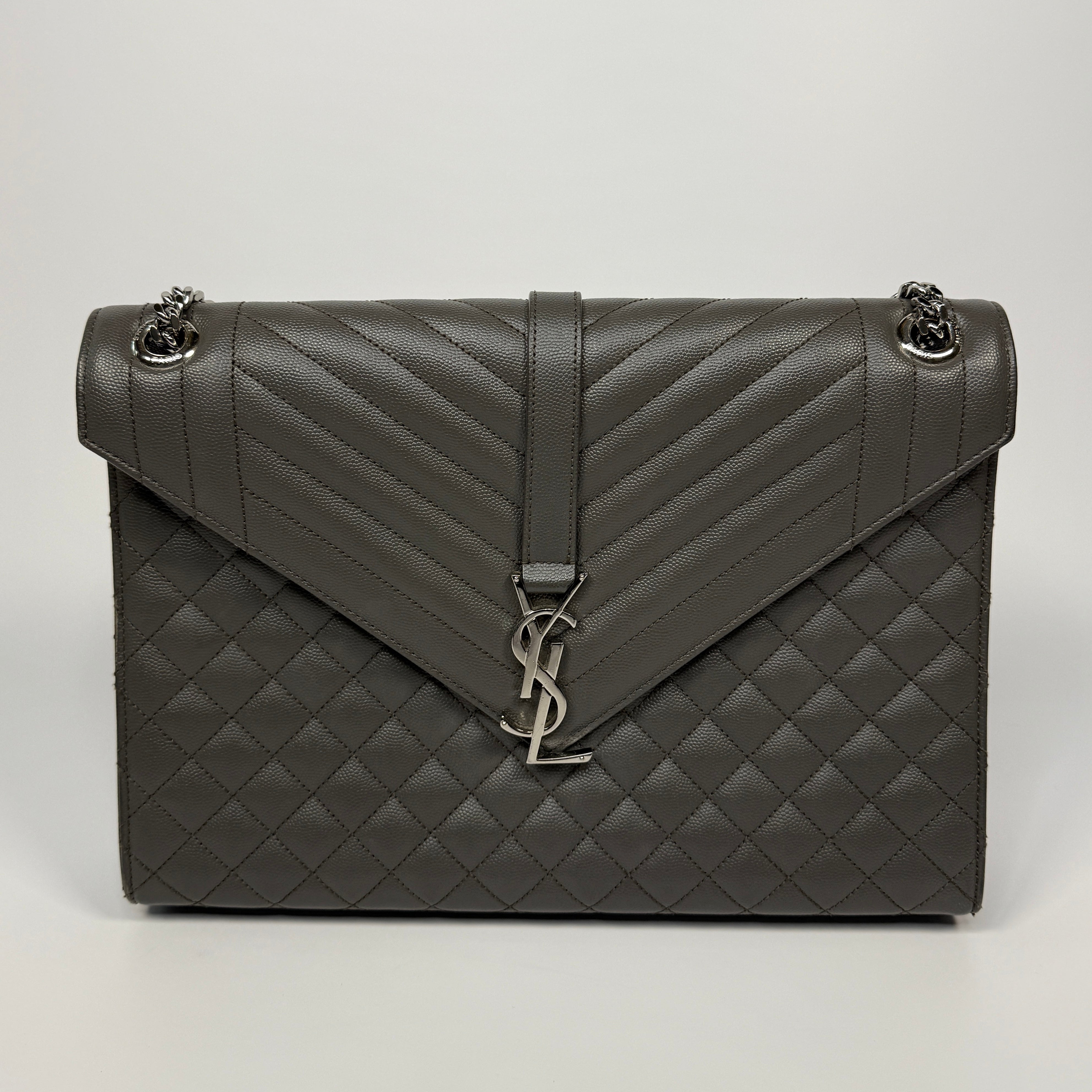 Saint Laurent Large Envelope Shoulder Bag In Grey Grained Leather With Silver Hardware. Excellent condition. Authentic and preloved.