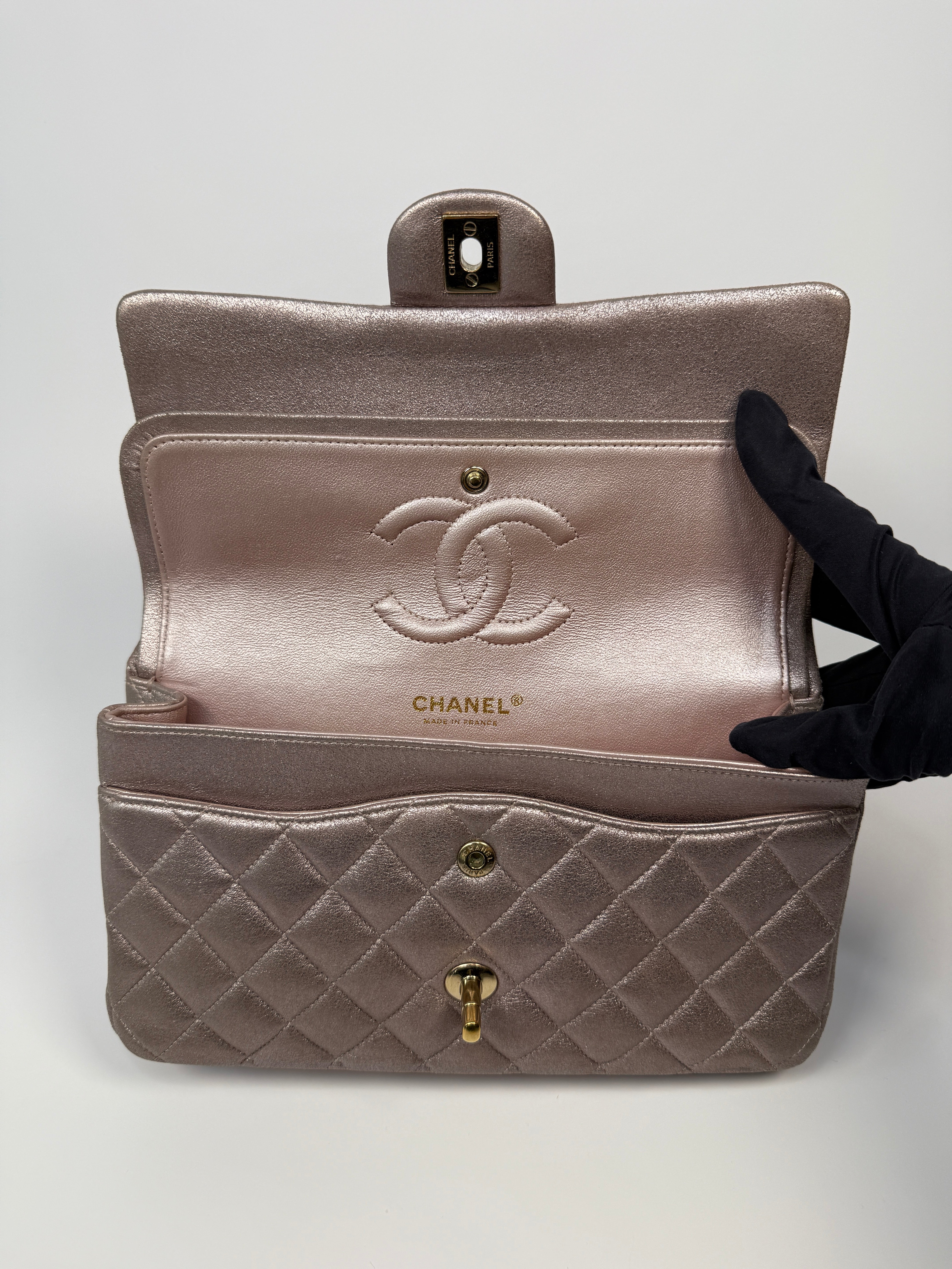 Authentic pre-loved Chanel Iridescent Rose Medium Classic Double Flap With Gold Hardware.