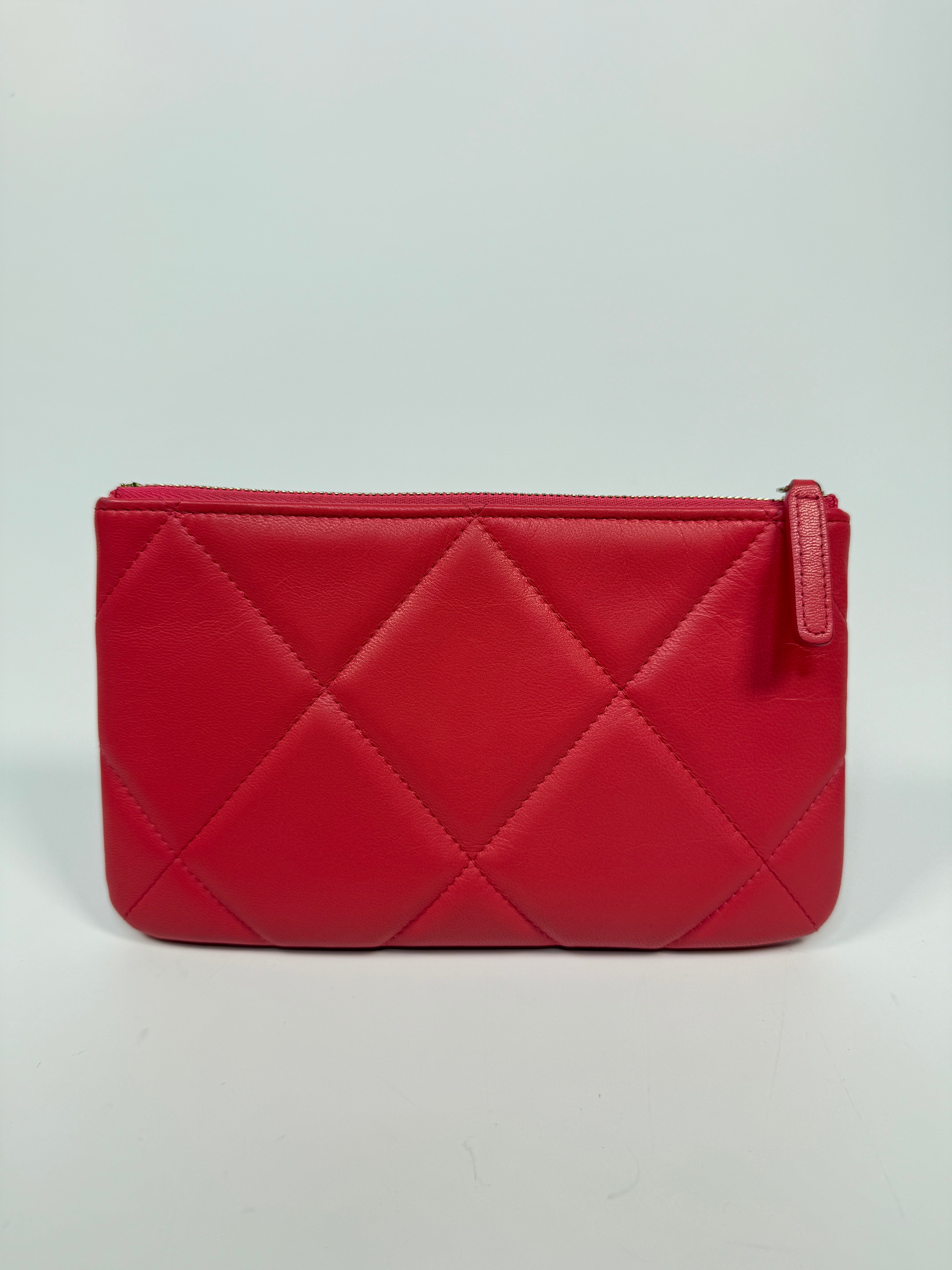 Chanel 19 Zip Pouch In Pink Calfskin Leather With Gold Hardware. Authentic preloved condition.