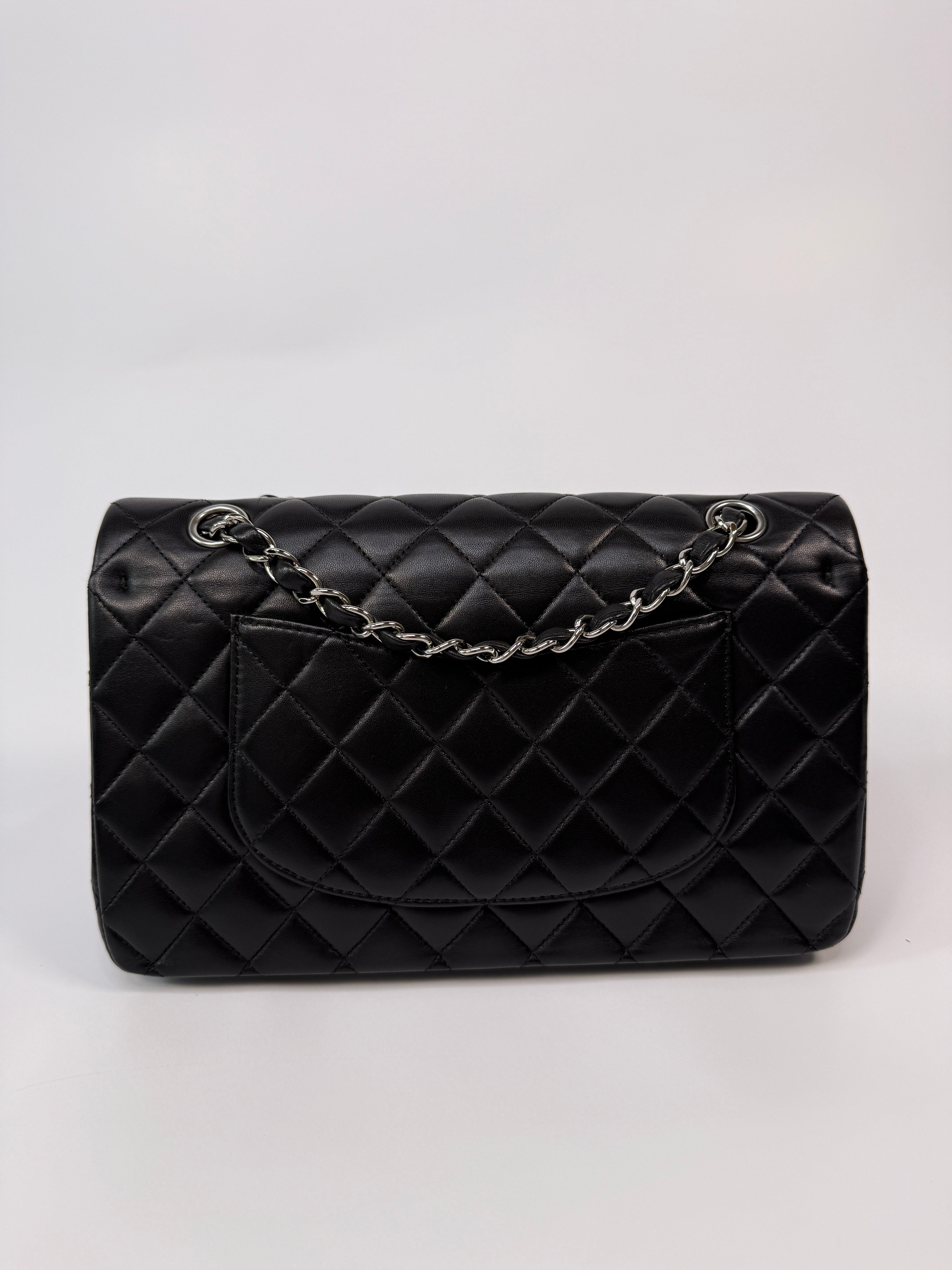 Chanel Medium Classic Double Flap Black Lambskin Leather With Silver Hardware
Pre Loved & Authentic