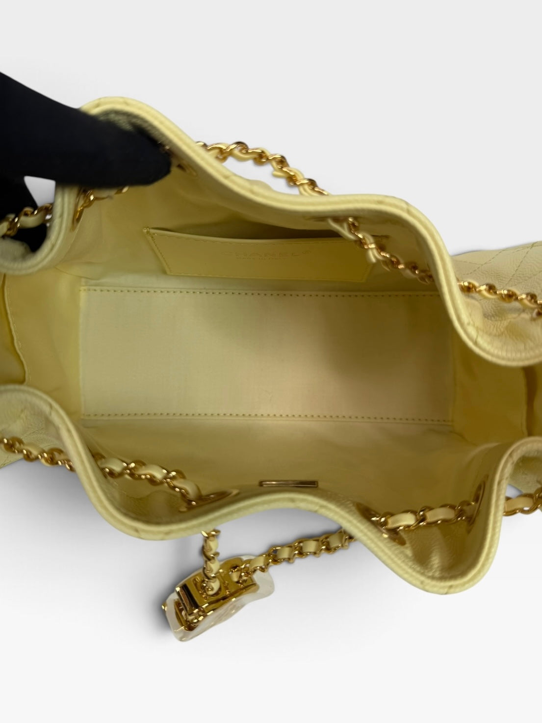 Chanel 25 Micro In Yellow Caviar Leather with Gold Hardware. 100% authentic and preloved in new and unused condition