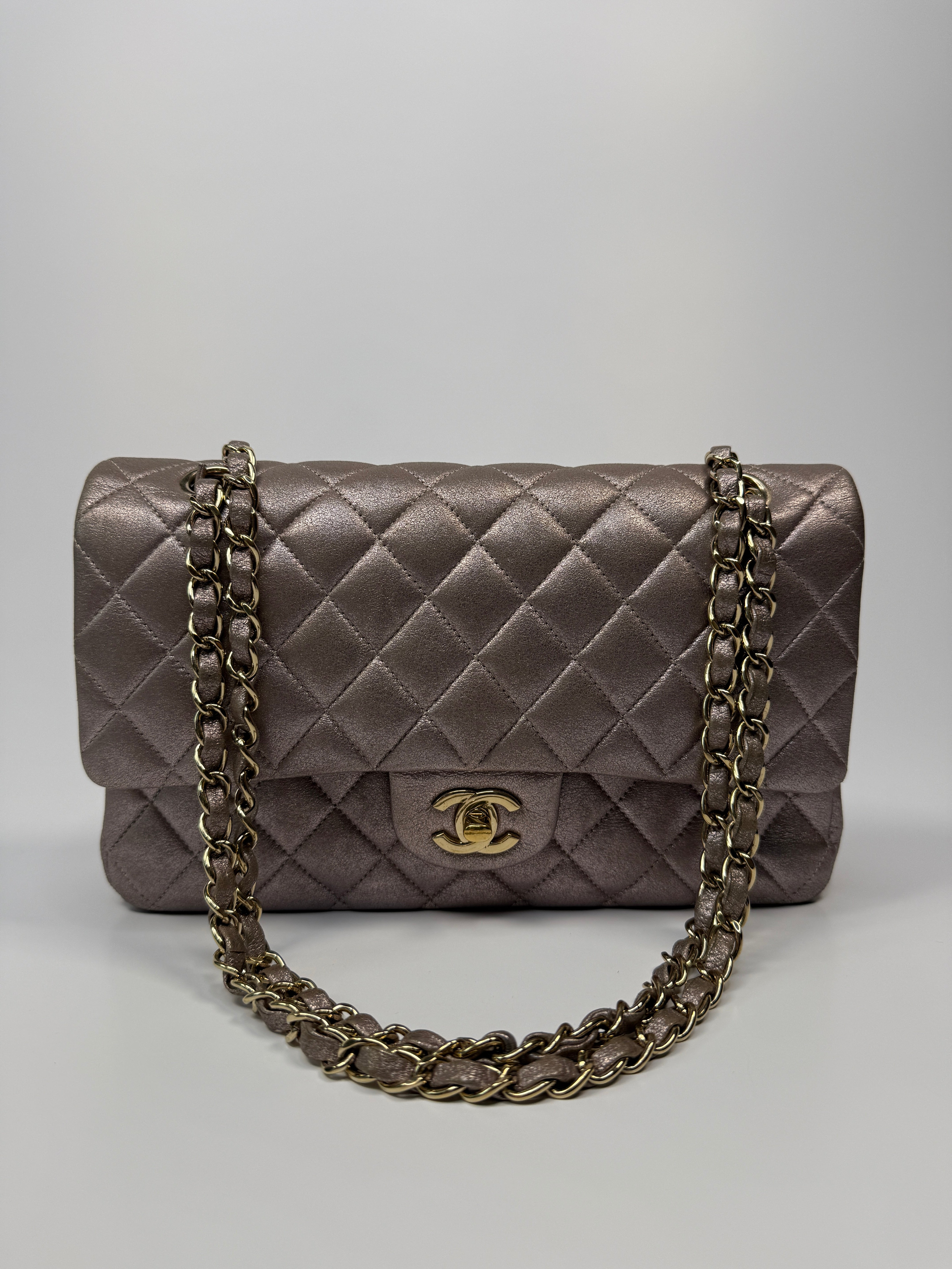 Authentic pre-loved Chanel Iridescent Rose Medium Classic Double Flap With Gold Hardware.