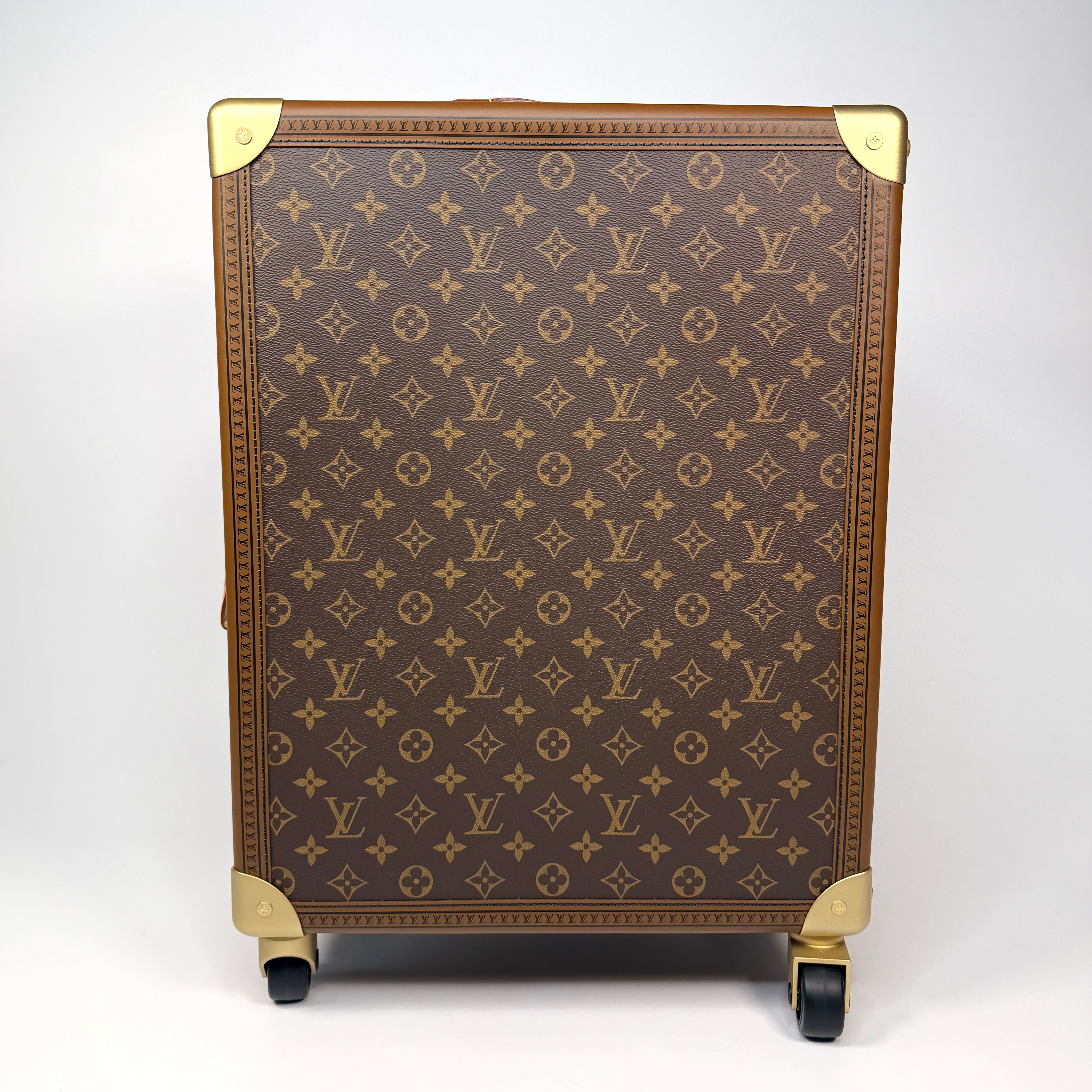 Louis Vuitton Monogram Trunk Roller authentic and preloved in new and unused condition