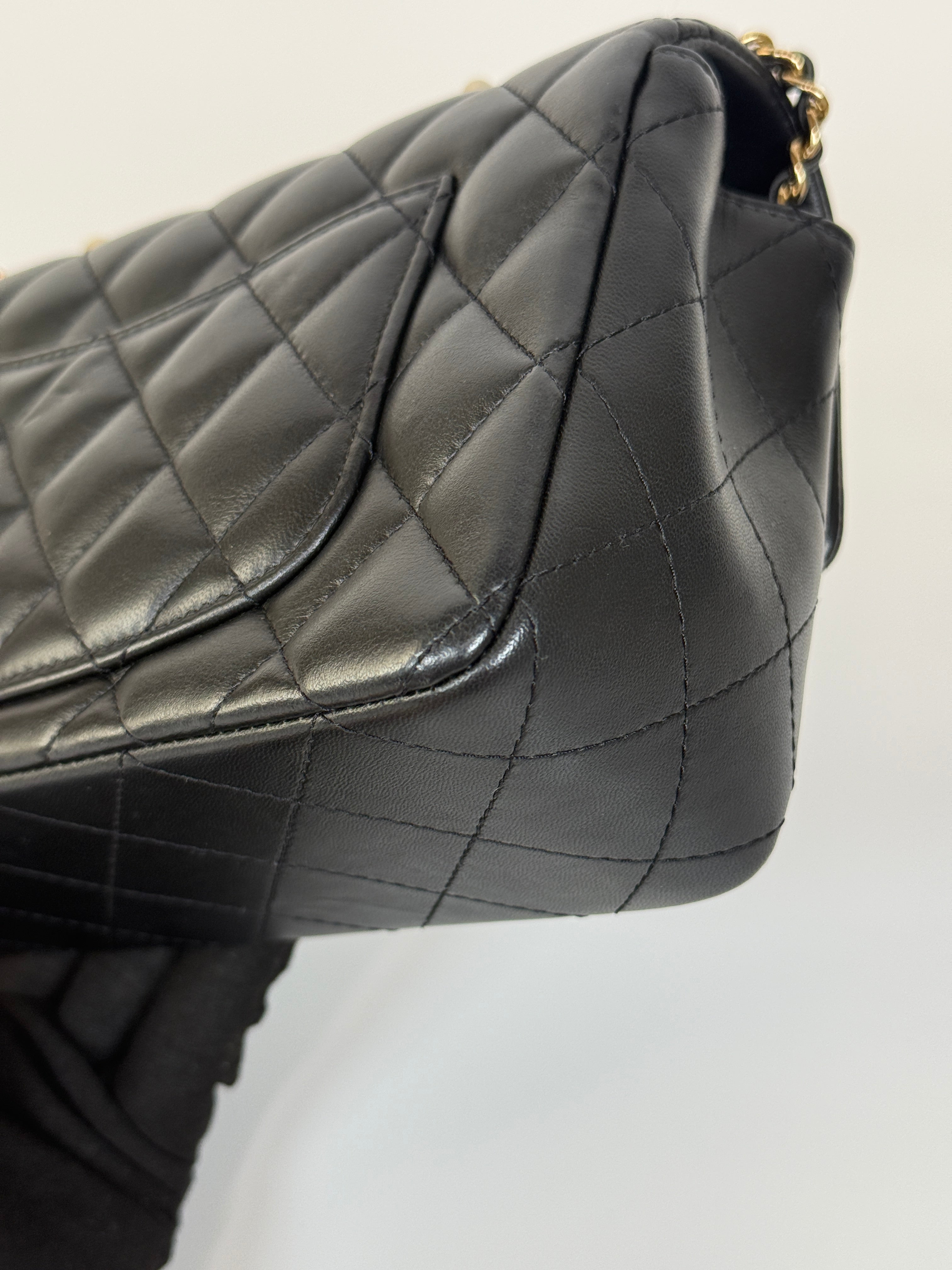 Authentic and preloved Chanel Mini Rectangle Top Handle Flap Bag In Black Lambskin With Gold hardware. Excellent Condition. 100% Authenticity guarantee