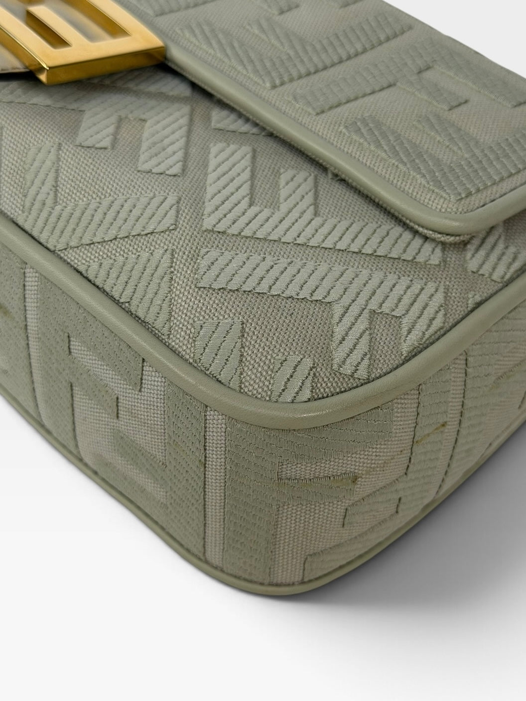 Fendi Baguette In Green Tea FF Monogram Fabric and Canvas With Gold Hardware. 100% authentic and preloved in excellent condition