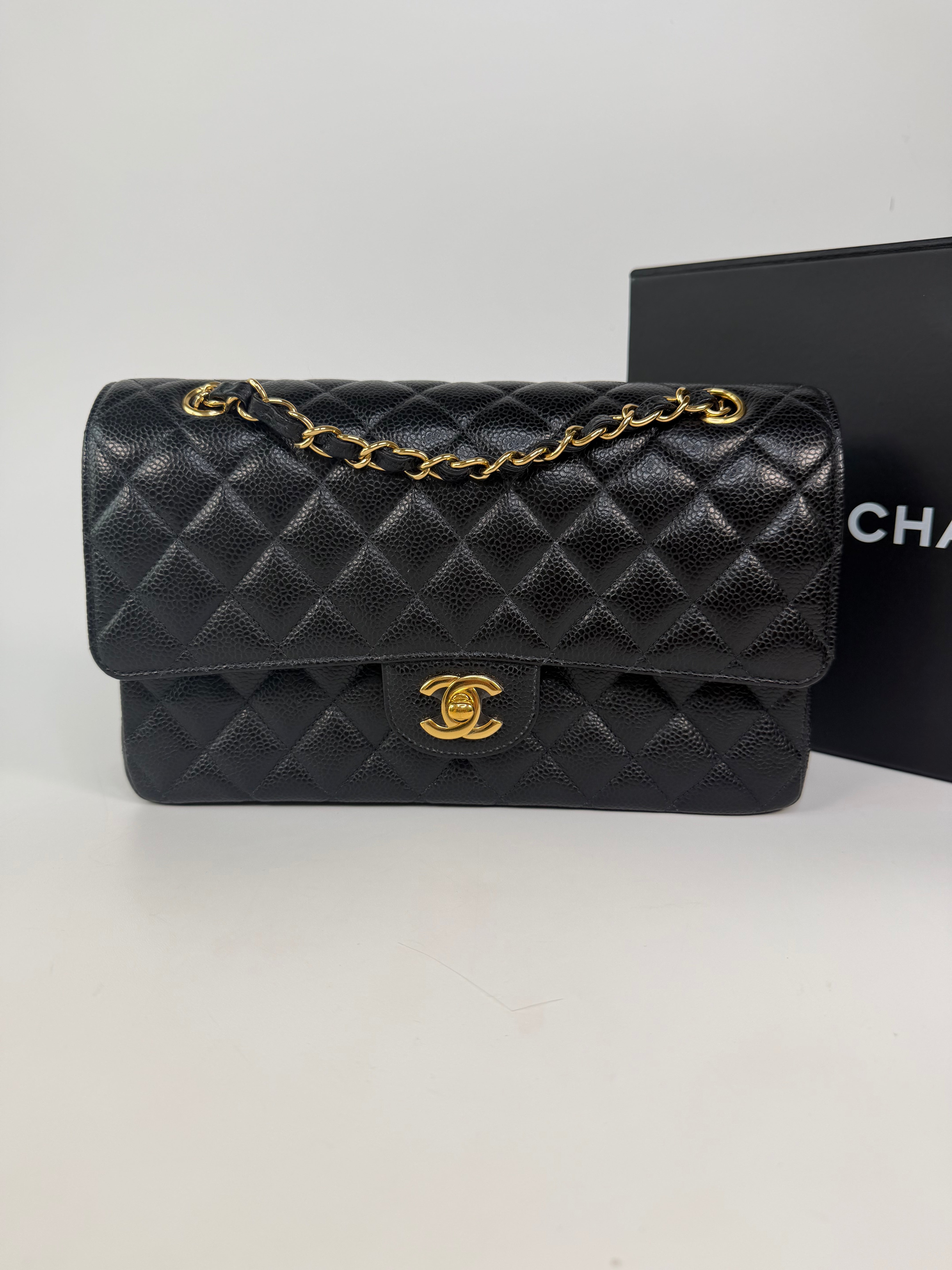 Chanel Medium Classic Double Flap In Black Caviar Leather Gold Hardware 100% authentic and preloved in excellent condition