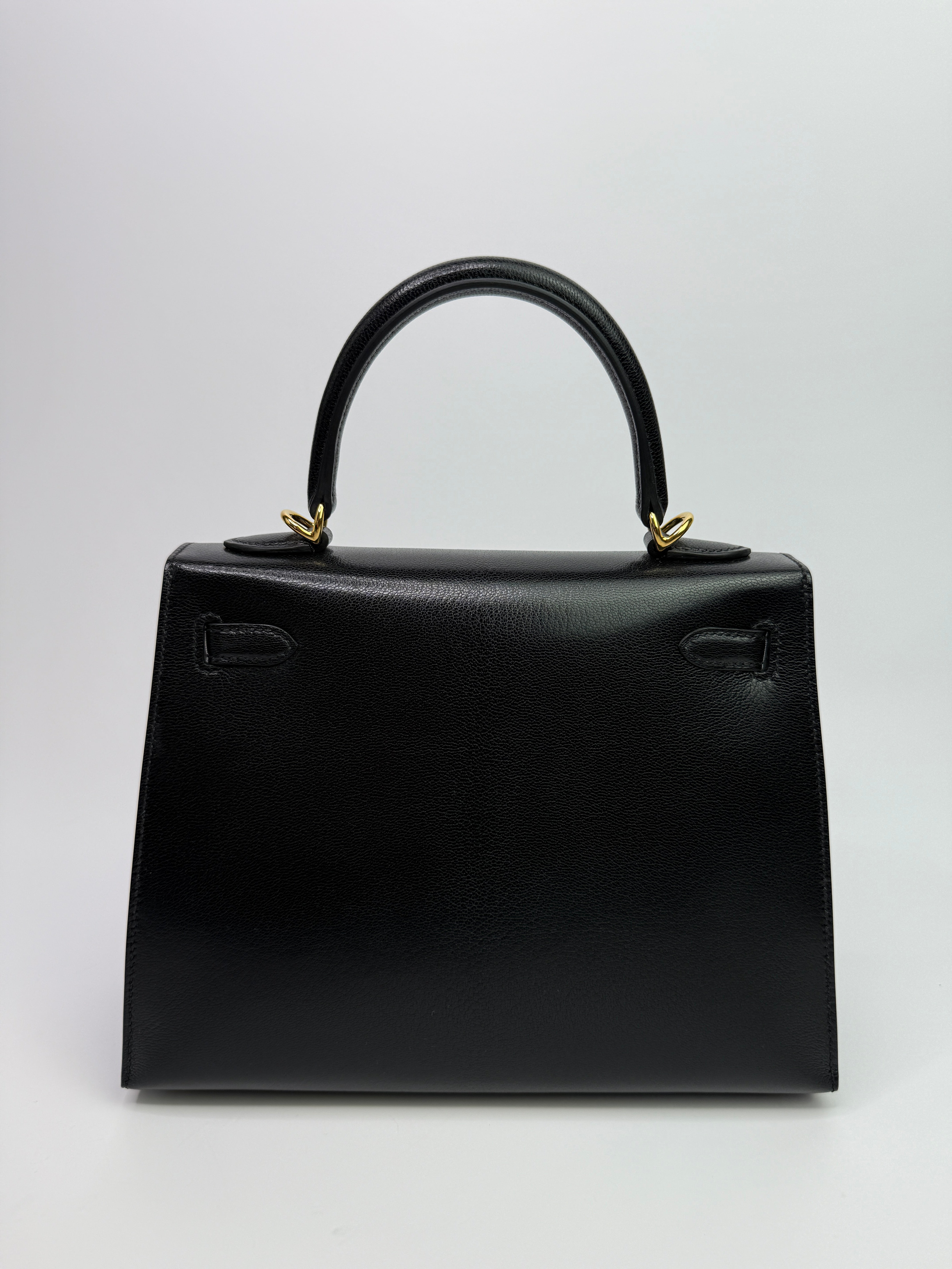 Authentic Pre Loved Hermès Kelly 25 Sellier In Black Chevre Chamilka Leather with Yellow Gold Hardware New & Unused Condition
