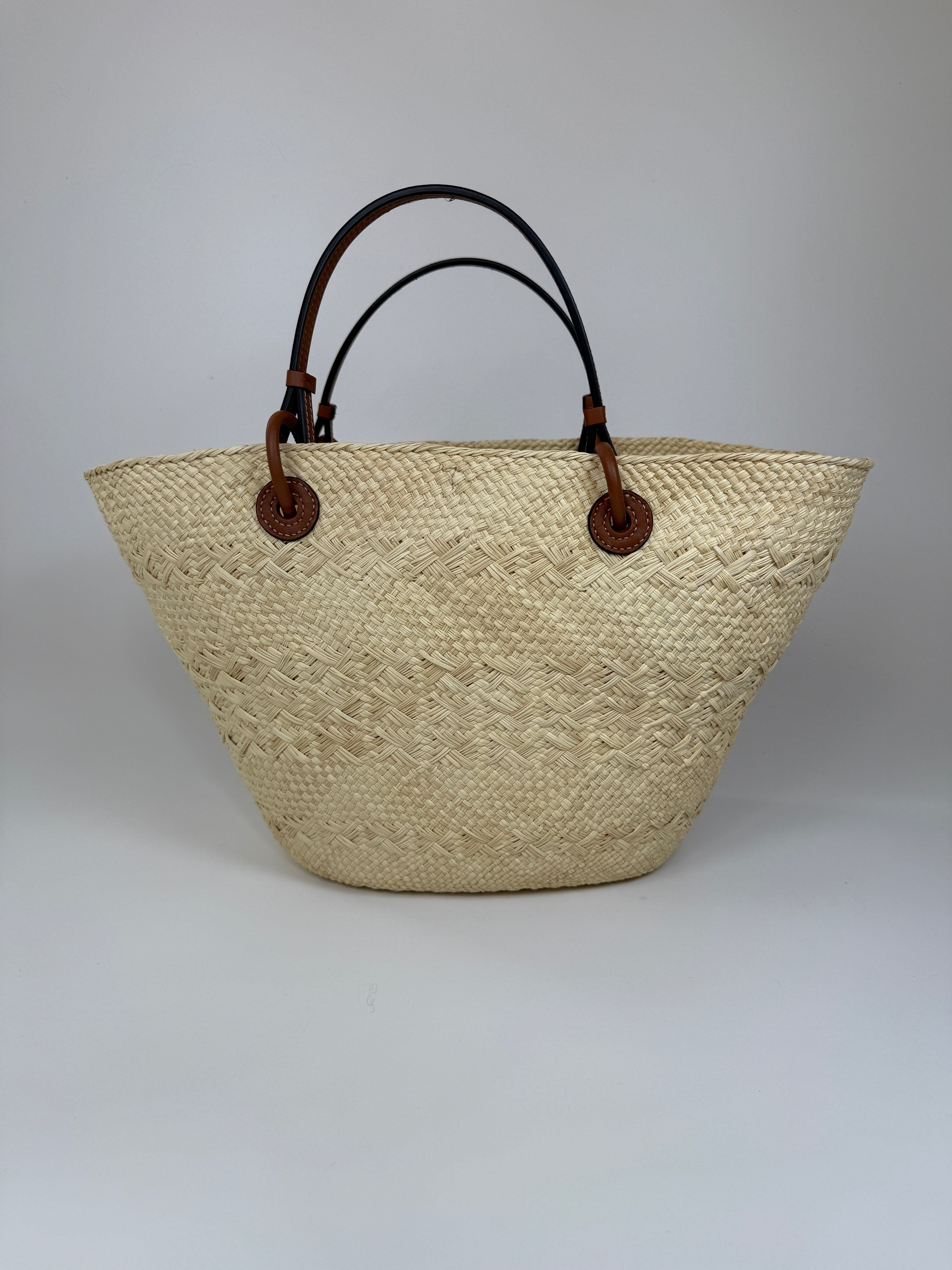 Authentic and preloved Loewe Paula's Ibiza Anagram Basket Bag In Excellent Condition. 100% Authenticity guarantee