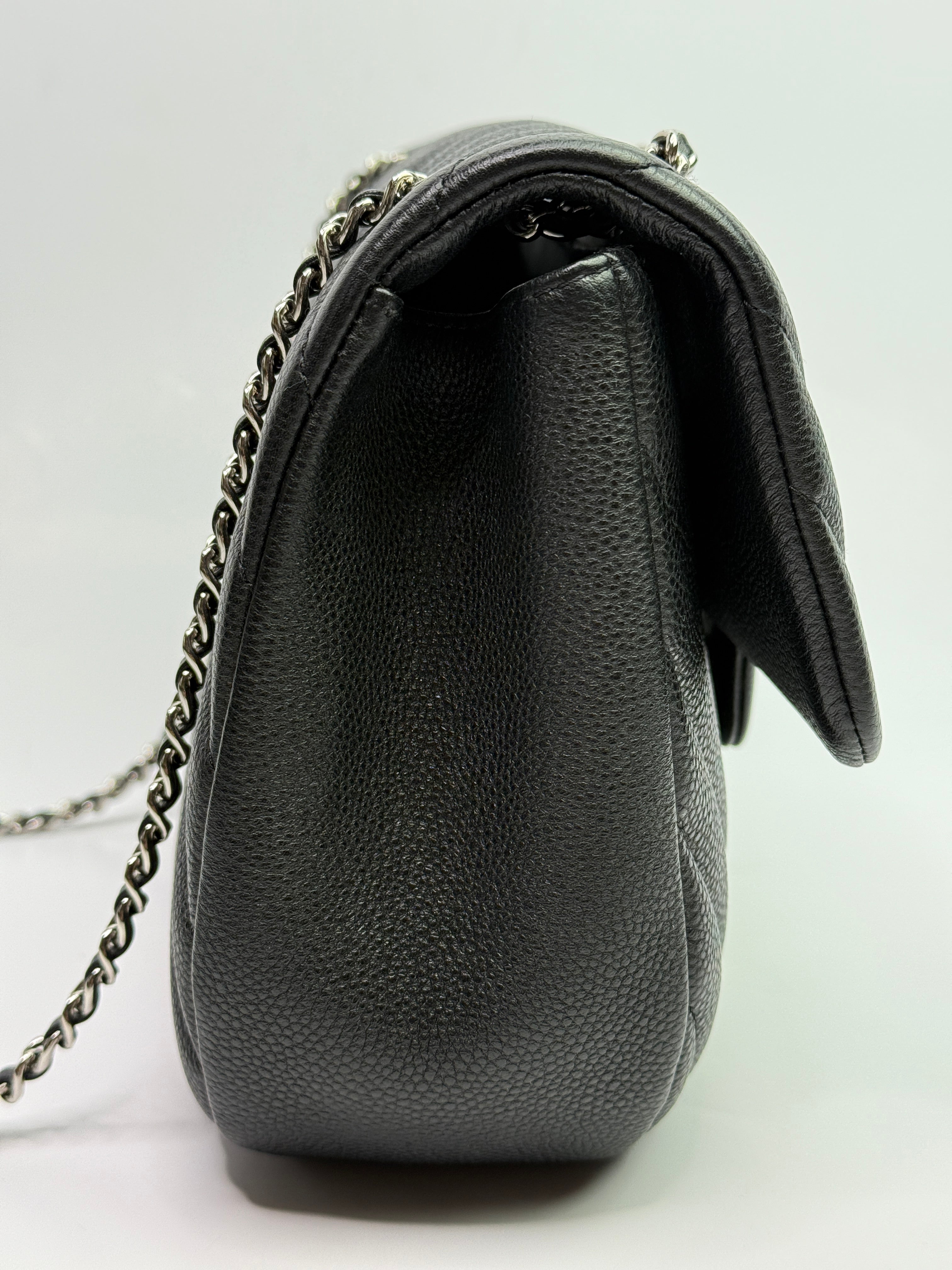 Chanel Seasonal Flap Bag In Black Chevron Caviar Leather With SHW