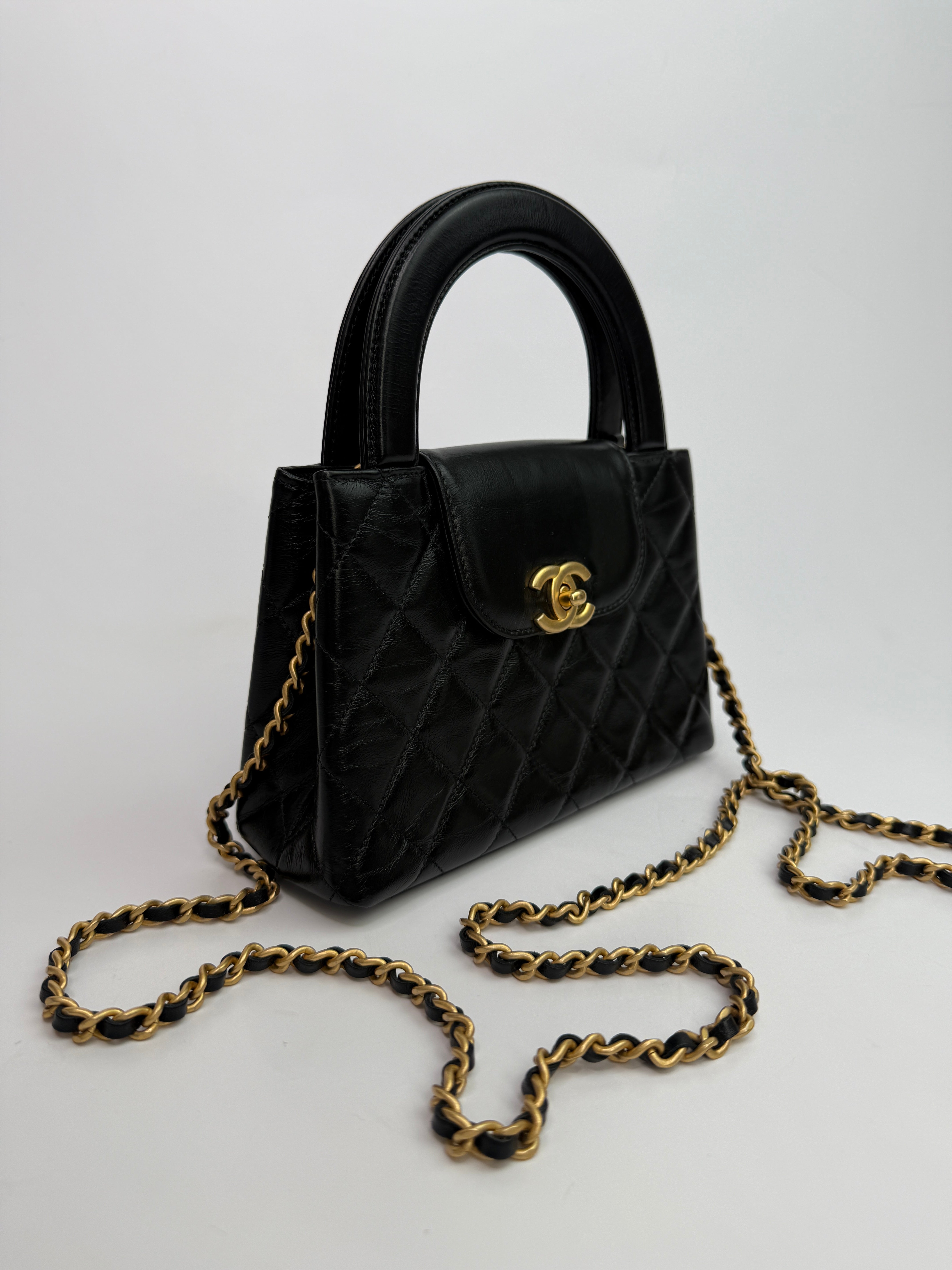 Chanel Mini Kelly Bag In Black Calfskin Leather with Gold Hardware
Pre Loved & Authentic
