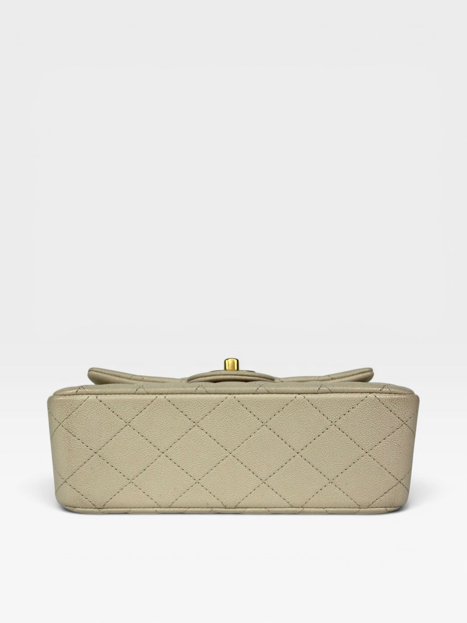 Chanel Mini Rectangle Top Handle In Cream Caviar Leather With Aged Gold Hardware. 100% authentic and preloved in excellent condition.