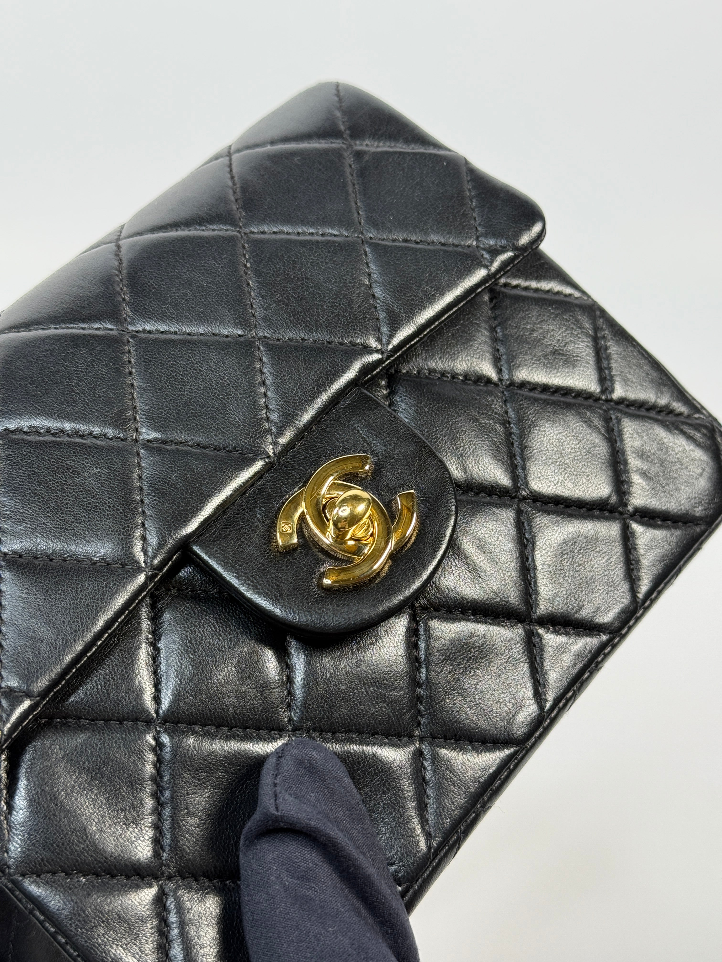 Chanel Black Square Vintage Flap Bag In Lambskin With Gold Hardware
Pre Loved & Authentic