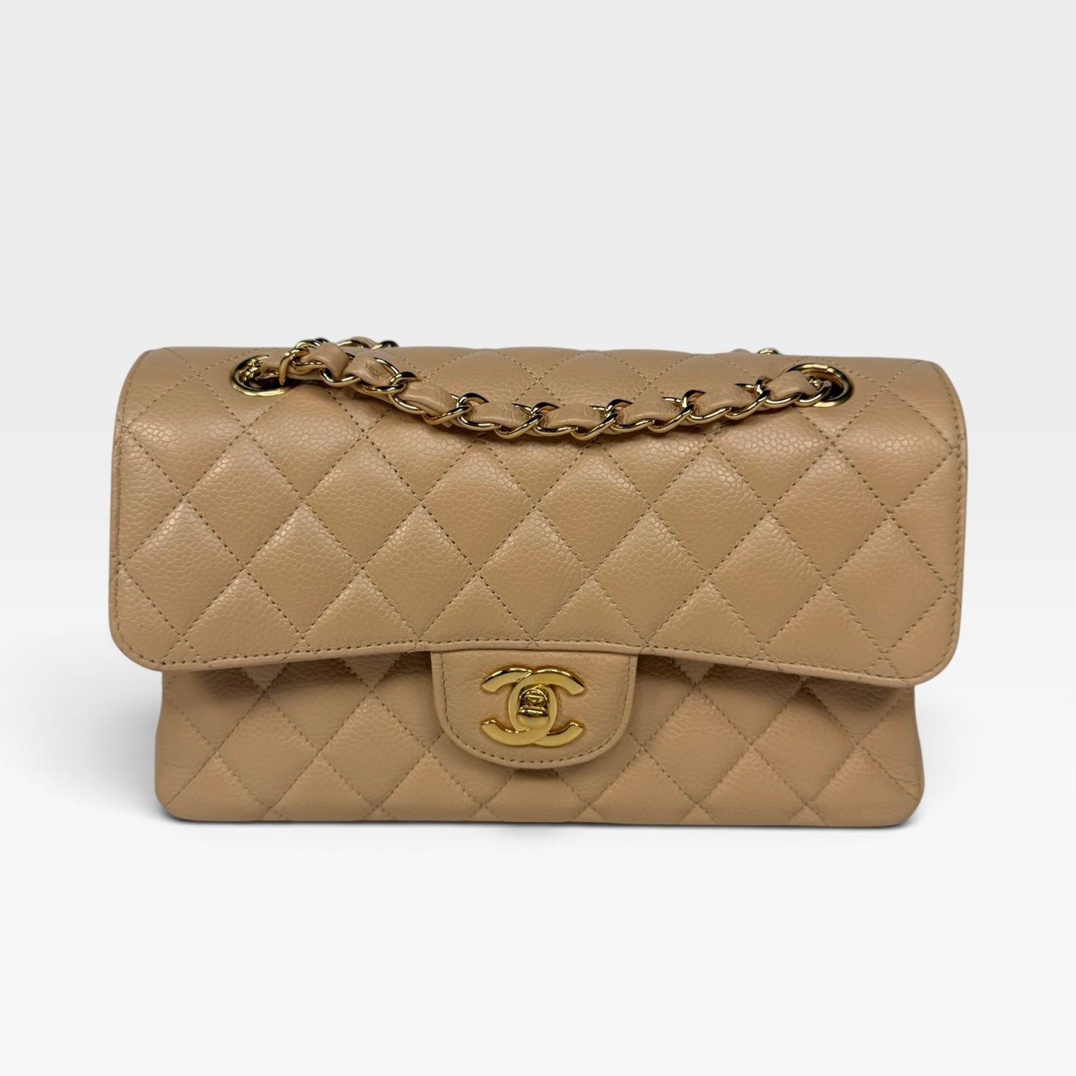 Chanel Small Classic Double Flap In Beige Caviar Leather With Gold Hardware. 100% authentic and preloved in excellent condition.